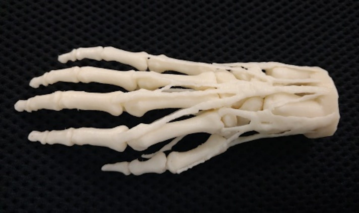 Stratasys is providing 3-D printers to VA hospitals to both create customized medical devices and training models such as this one of a hand.