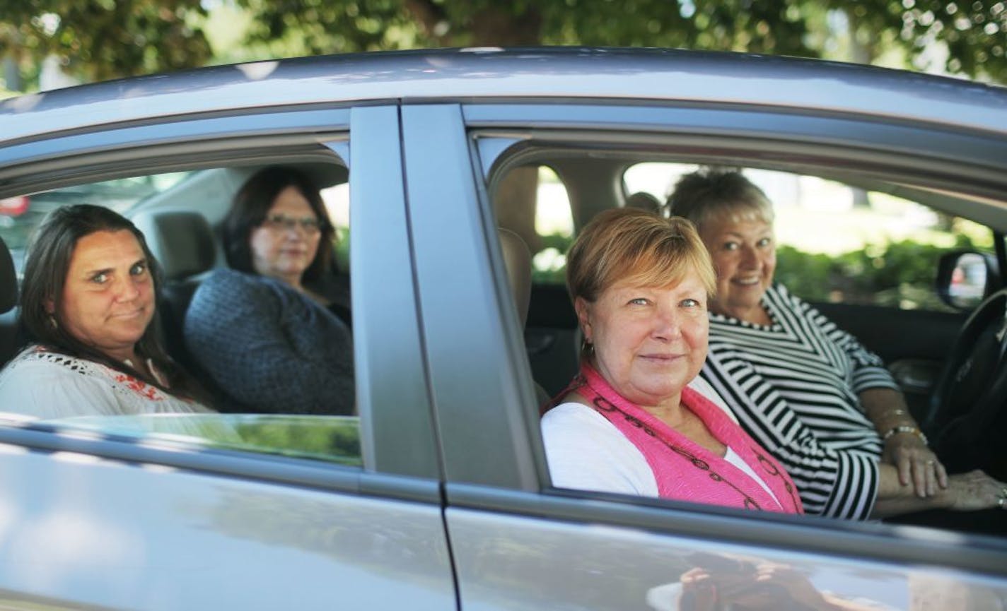 Four mothers with sons in the Minnesota Security Hospital in St. Peter prepare to embark to St. Peter for a one of their regular meetings to advocate for their sons who are psychiatric patients at the hospital Tuesday, July 12, 2016, in St. Paul. MN. Among those mothers were, left to right, Lynda Hansen; a mom who didn't want to be named, Sheila Novak and Connie Kishel.