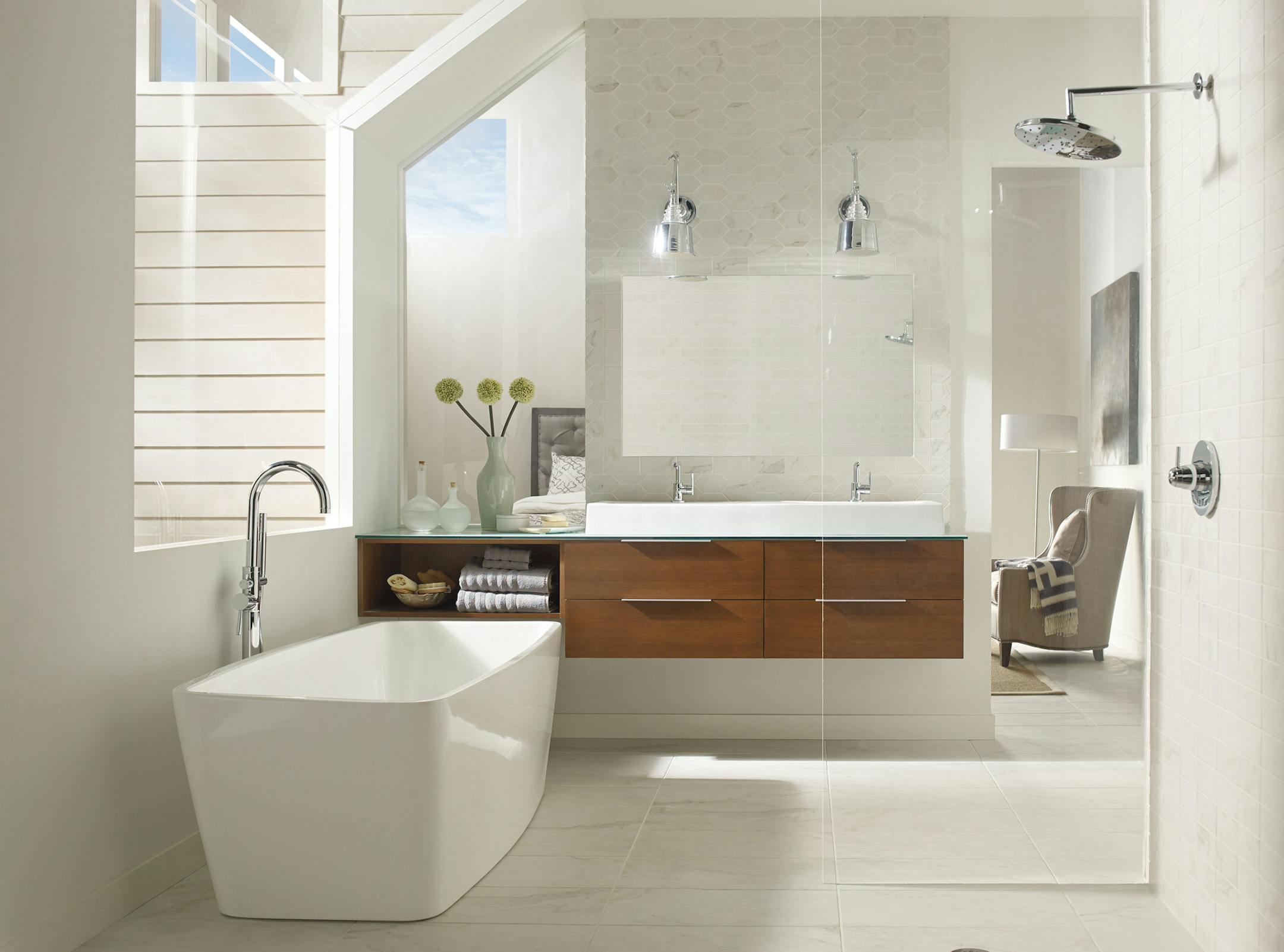 A wall-hung vanity makes the most of storage but leaves room for plumbing and allows easy cleaning and maneuvering underneath. (MasterBrand Cabinets)