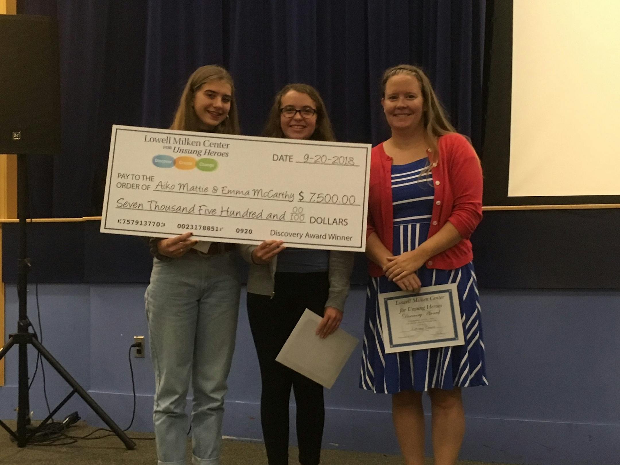 Students Aiko Mattie, left, and Emma McCarthy, right, with their teacher and advisor, Katie Craven.