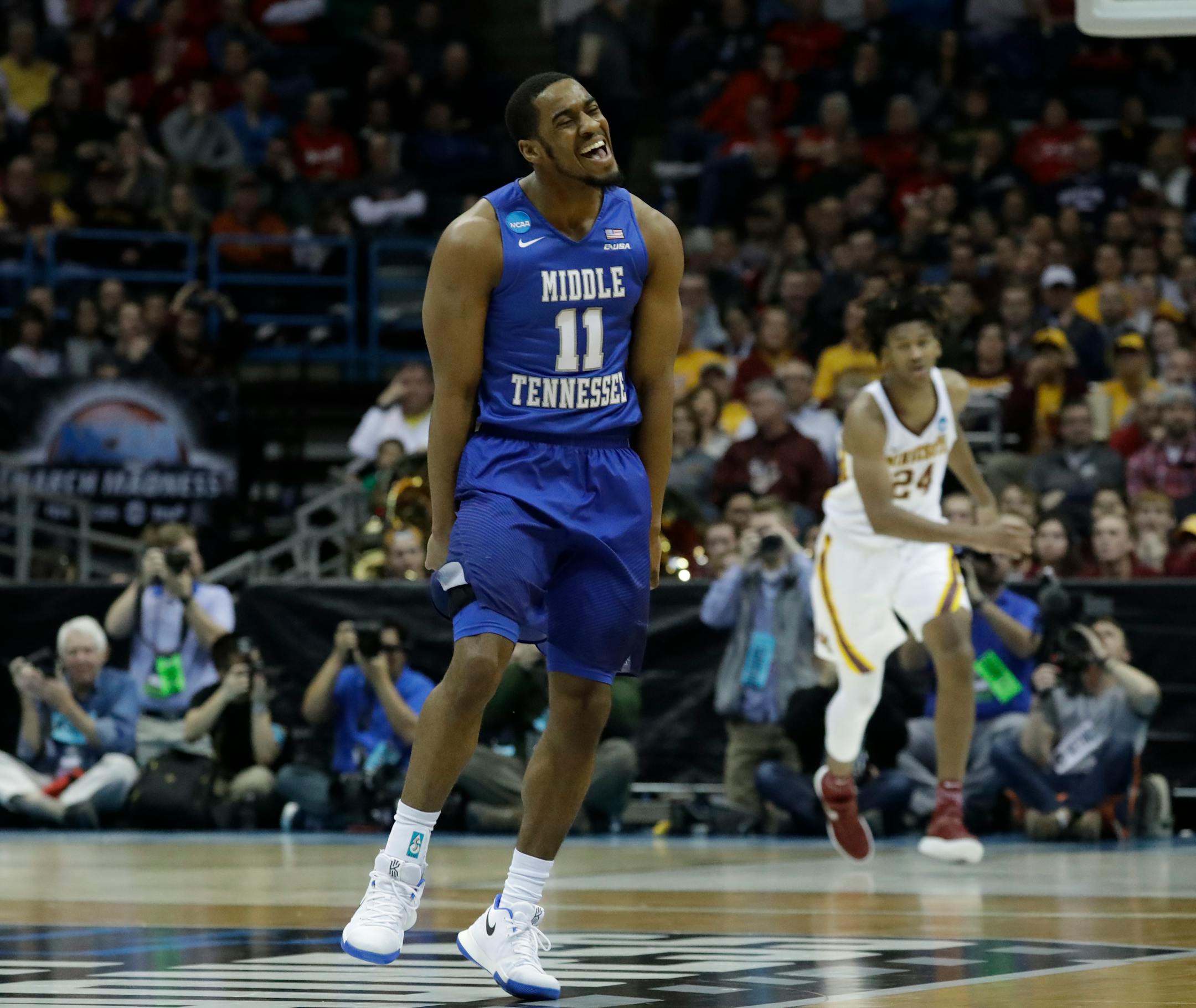 Middle Tennessee State's Edward Simpson (11) reacts after making a three-point basket during the first half of an NCAA college basketball tournament first round game against Minnesota Thursday, March 16, 2017, in Milwaukee. (AP Photo/Morry Gash)