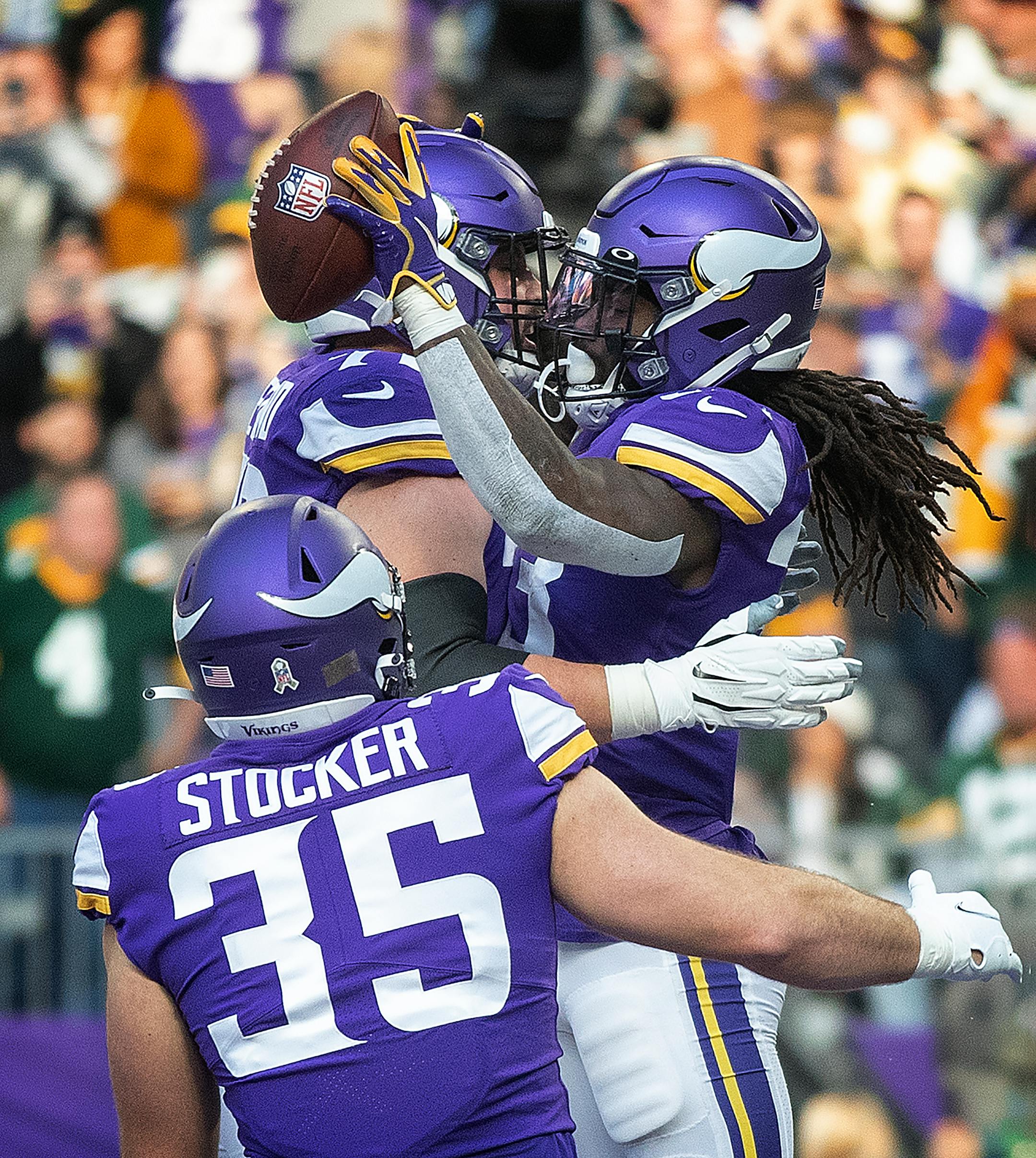 Minnesota Vikings running back Dalvin Cook ,(33) celebrates his one yard run with guard Ezra Cleveland (72) in the fourth quarter.