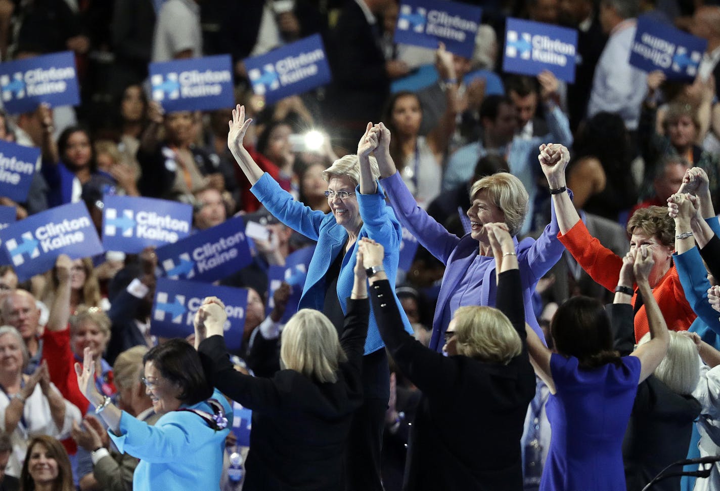 Sen. Elizabeth Warren, D-Mass., top left, and others react on stage during the final day of the Democratic National Convention, Thursday, July 28, 2016, in Philadelphia. (AP Photo/John Locher)