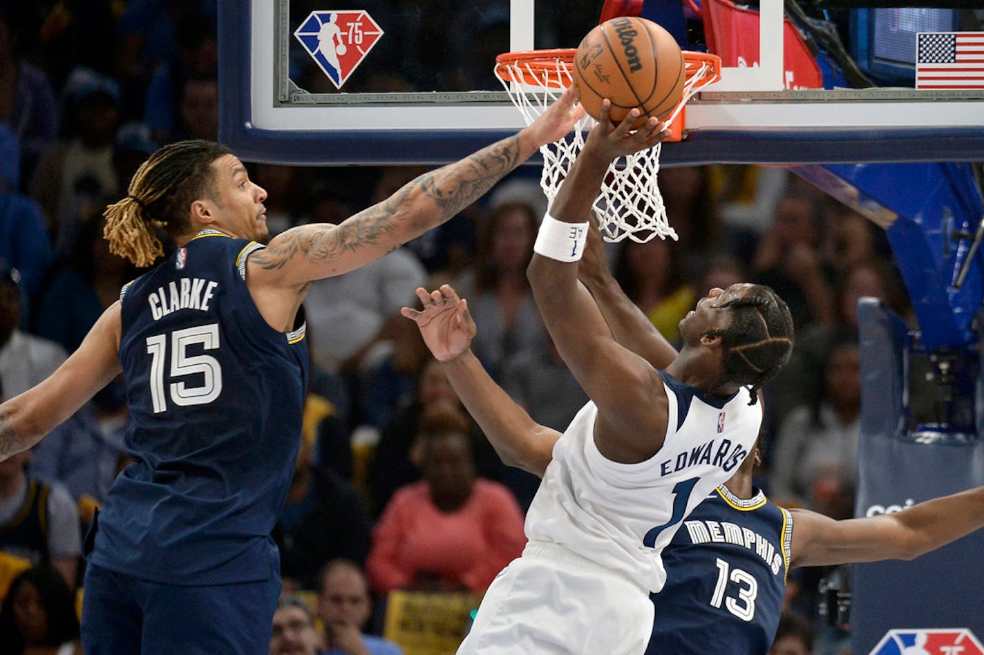 Minnesota Timberwolves forward Anthony Edwards (1) shoots against Memphis Grizzlies forward Brandon Clarke (15) on Tuesday.