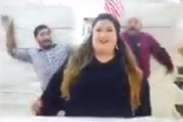 A screen capture shows a woman and two men hamming it up in a Texas mattress store's 9/11-themed ad.