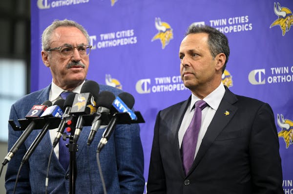 Vikings co-owners Zygi, left, and Mark Wilf speak after a news conference introducing Kevin O’Connell as the team’s head coach in February.