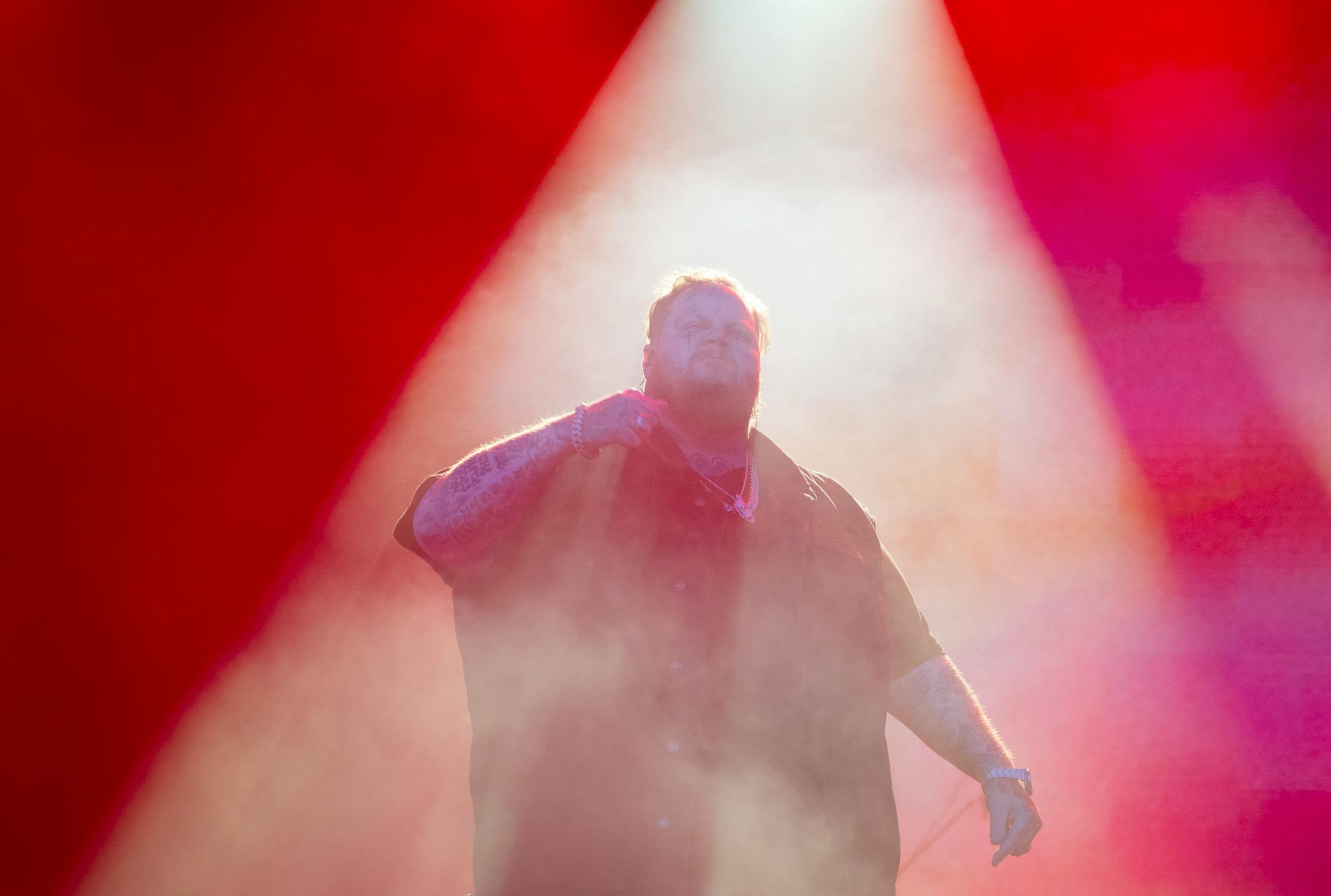 Jelly Roll, a rising country music star, walks onto the stage Friday, July 07, 2023, at Mystic Lake Casino amphitheater in Prior Lake, Minn.