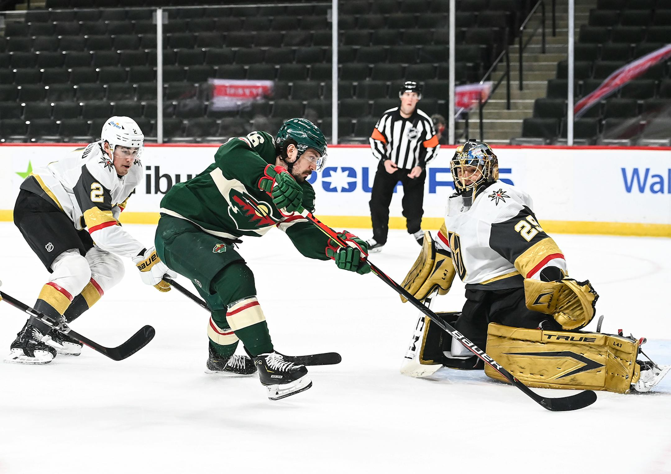 Minnesota Wild right wing Mats Zuccarello (36) missed a shot as he was challenged by Vegas Golden Knights goaltender Marc-Andre Fleury (29) in the first period.