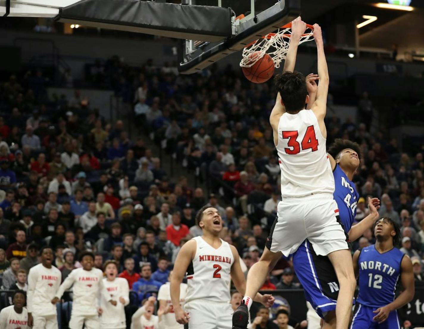 Chet Holmgren (34) dunked during a game against Minneapolis North.