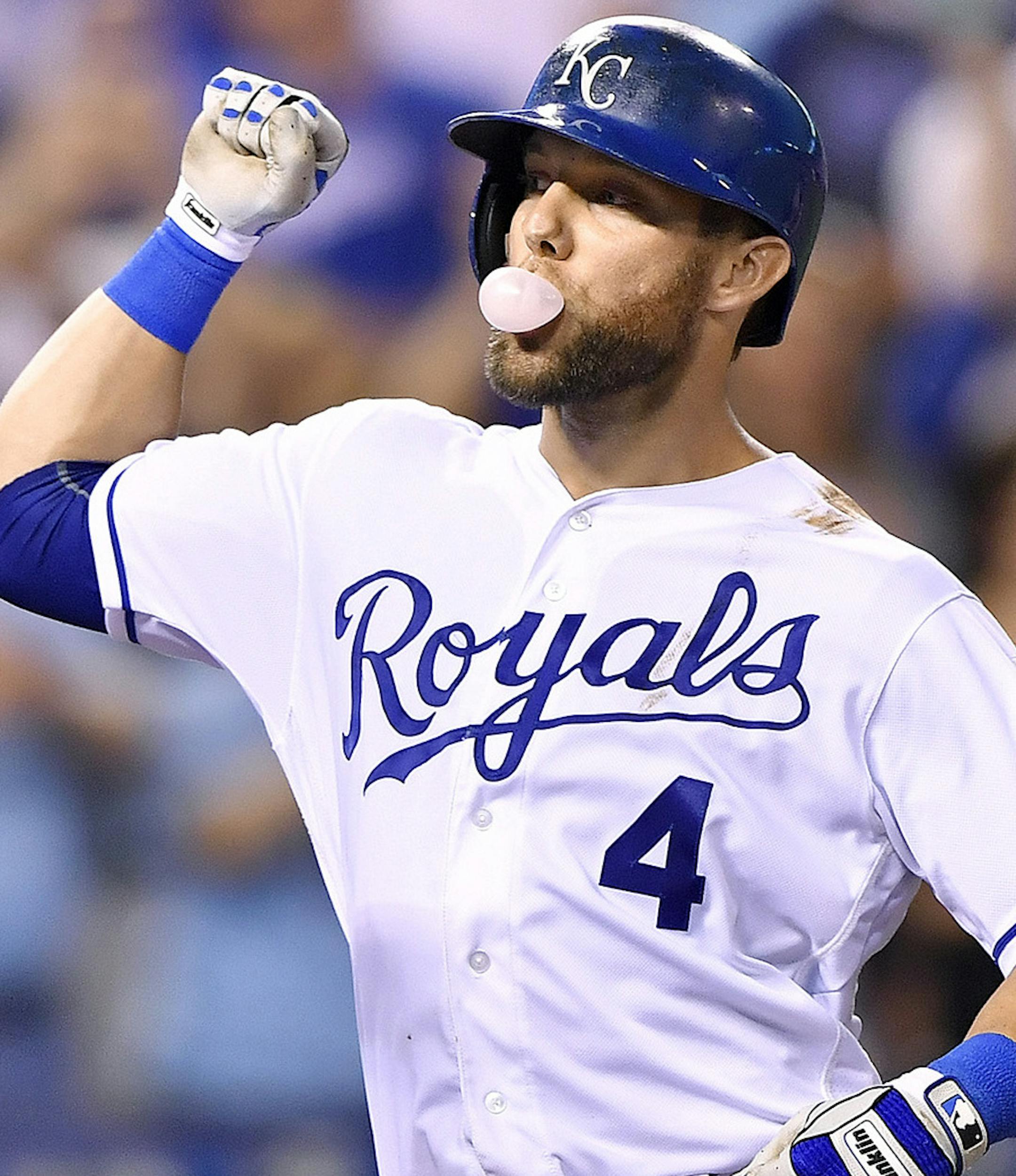 The Kansas City Royals' Alex Gordon is congratulated by Salvador Perez, Eric Hosmer and Kendrys Morales after hitting a grand slam in the fourth inning against the Minnesota Twins on Thursday, Aug. 18, 2016, at Kauffman Stadium in Kansas City, Mo. (John Sleezer/Kansas City Star/TNS)