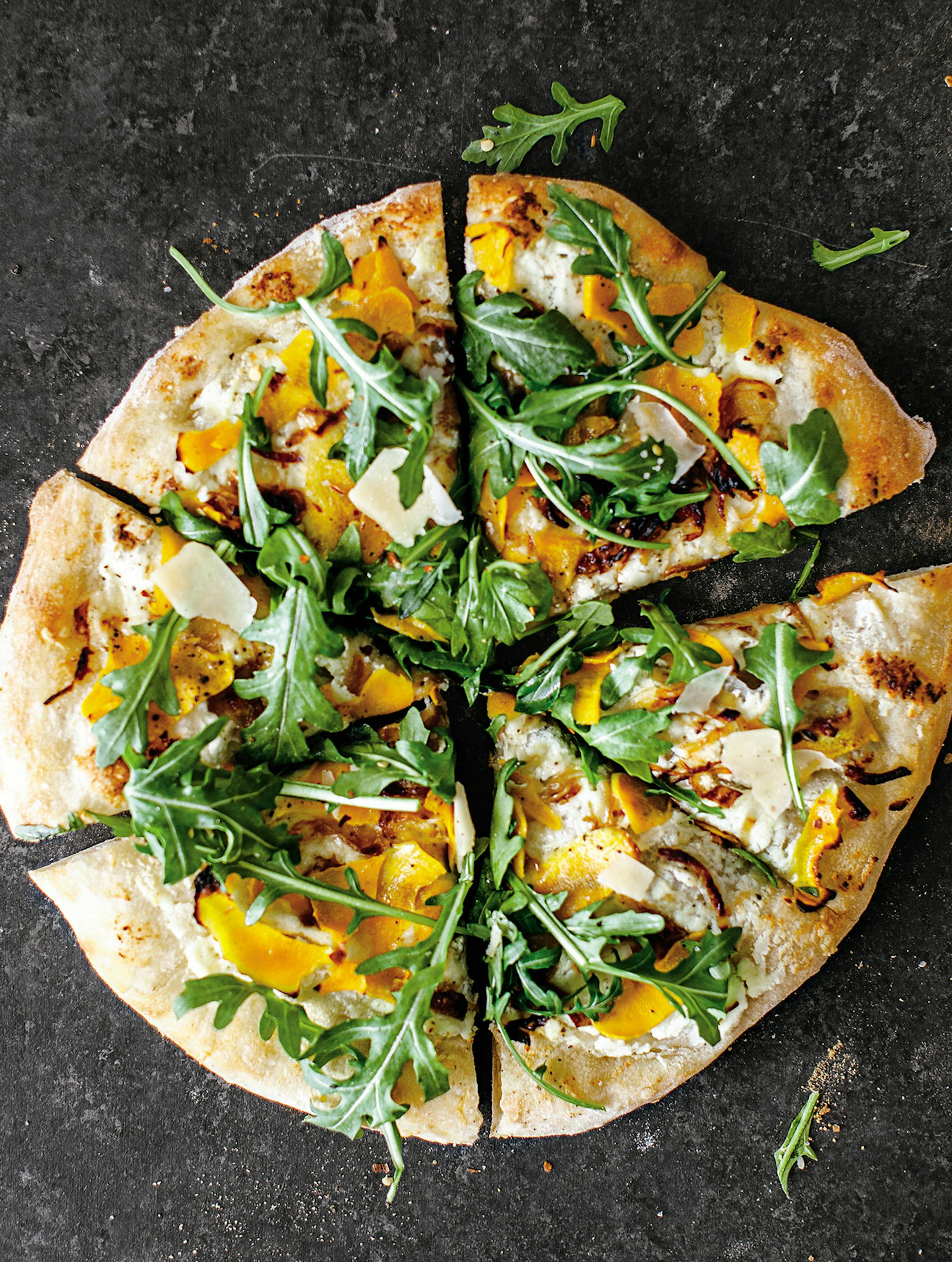 Credit: Molly Yeh
Squash and Ricotta Pizza With Sage and Arugula, from "Molly on the Range," by Molly Yeh.