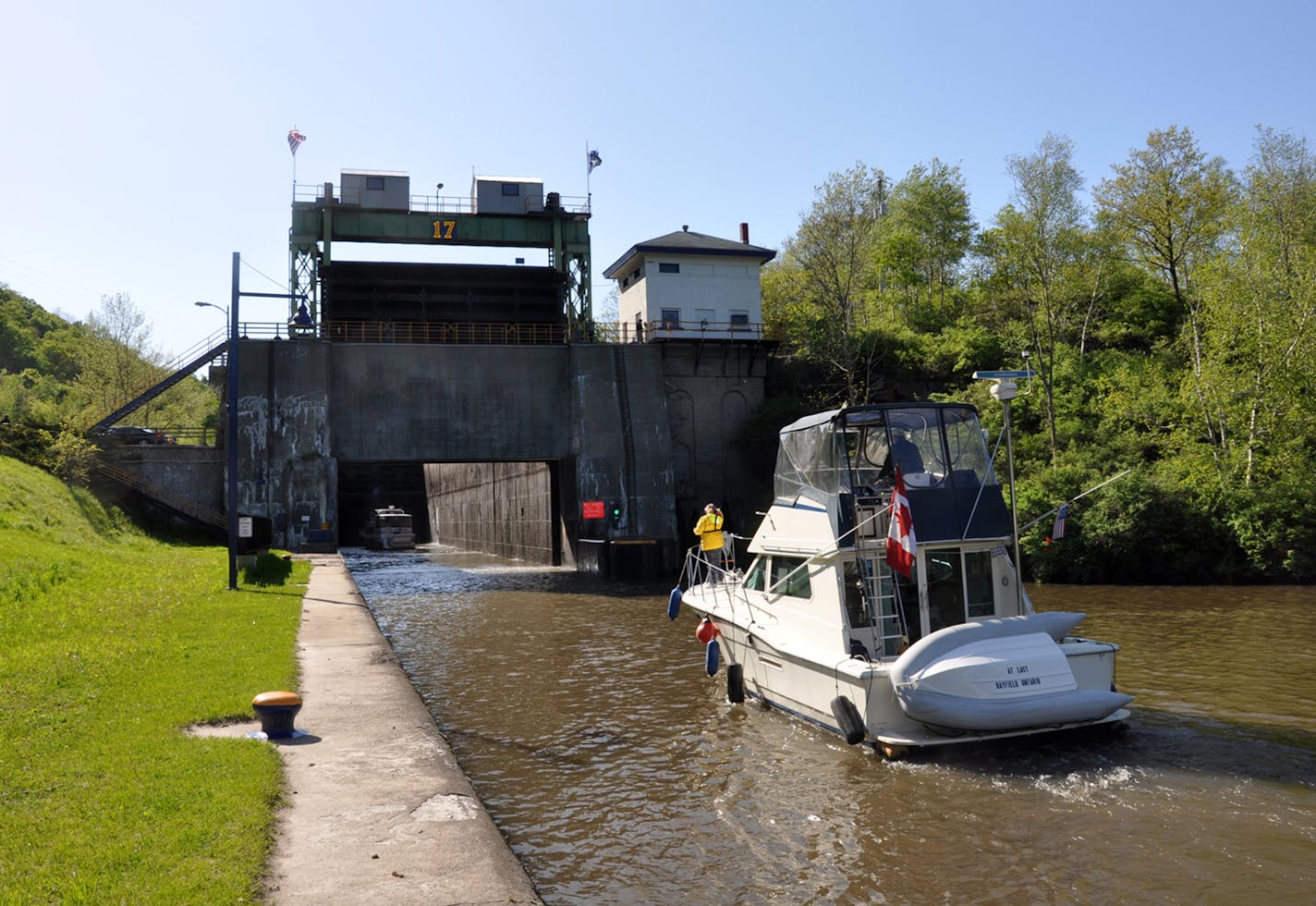 A boat heads toward Lock 17. Locks are elevators for boats, lifting and lowering them as they travel along the waterway. Today, there are 57 locks on New York's canal system. (Erie Canalway National Heritage Corridor)