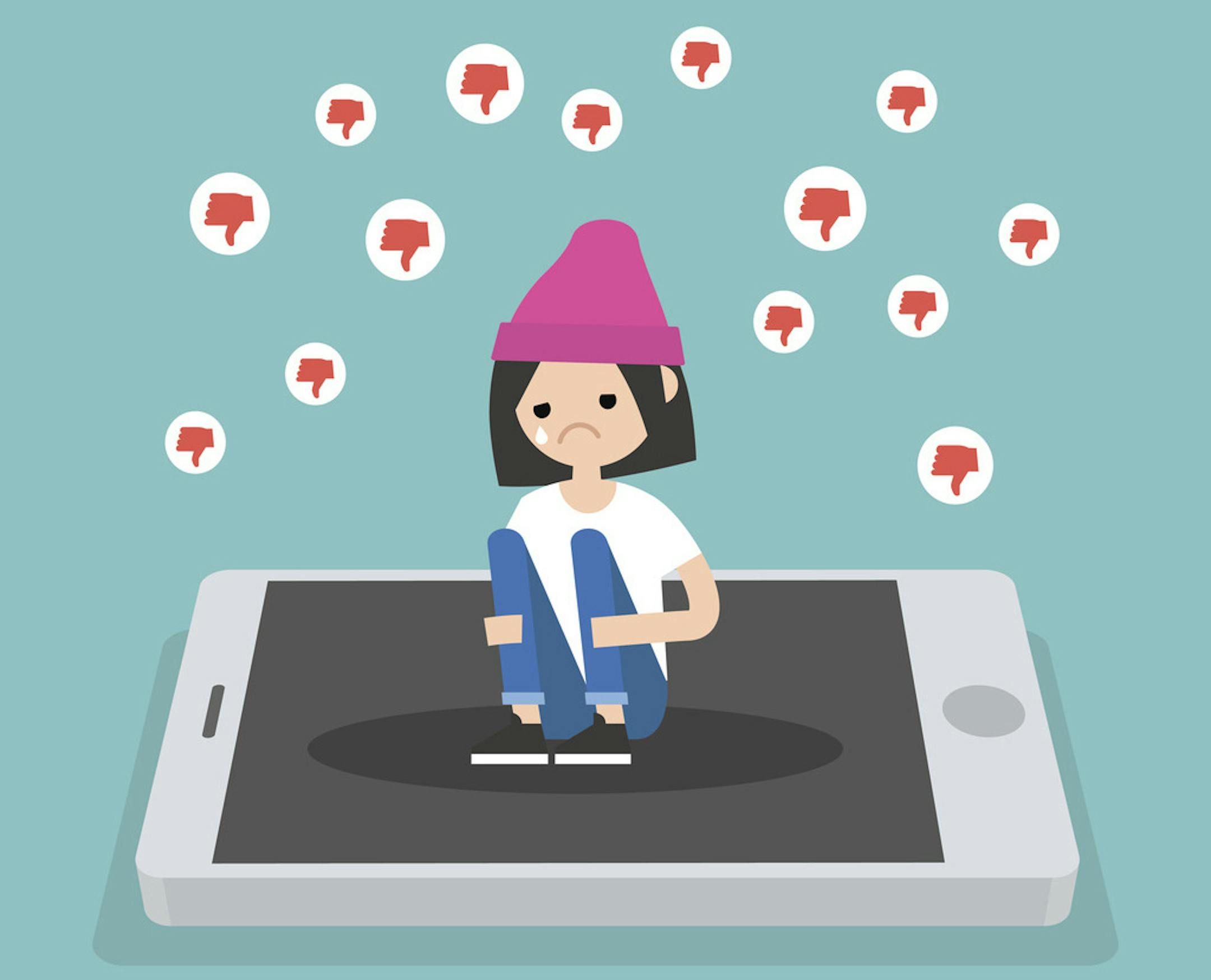 Upset crying girl sitting on the mobile's screen and hugging her knees surrounded by the dislike symbols / editable flat vector illustration, clip art