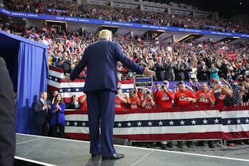 President Donald Trump greeted cheering crowds at the Target Center in Minneapolis, Minnesota.