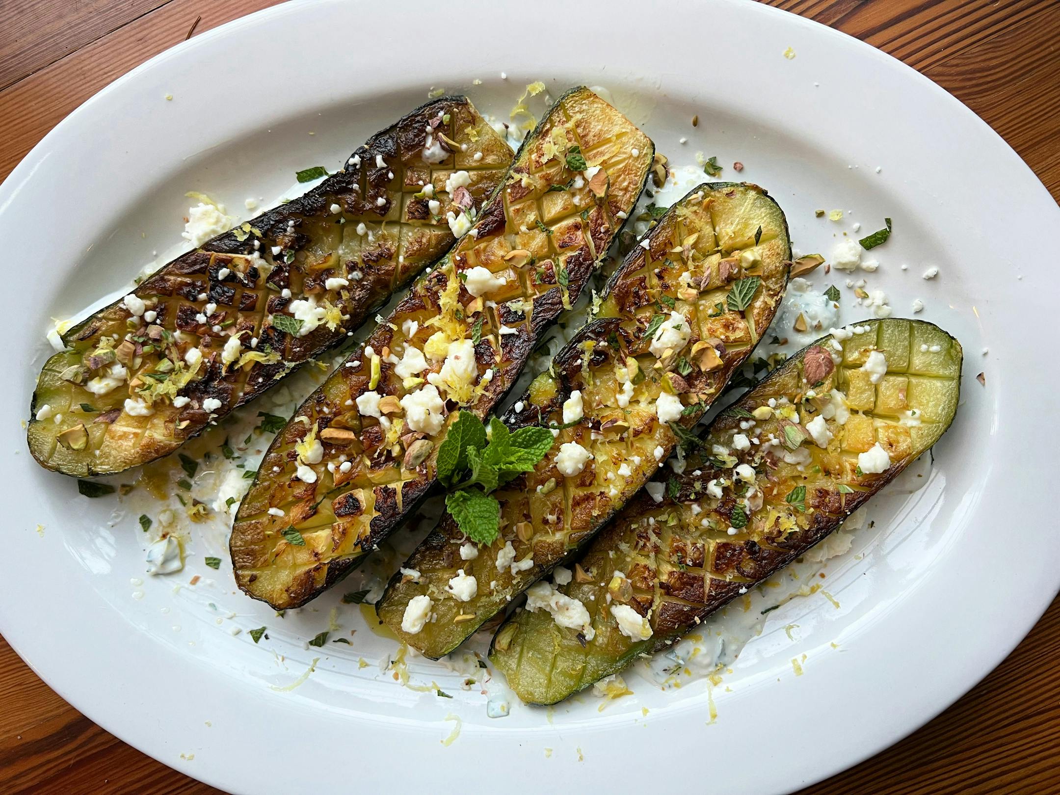Pan-roasted zucchini, a Mediterranean-style dish with feta, mint and crushed pistachio. (Gretchen McKay/Pittsburgh Post-Gazette/TNS)