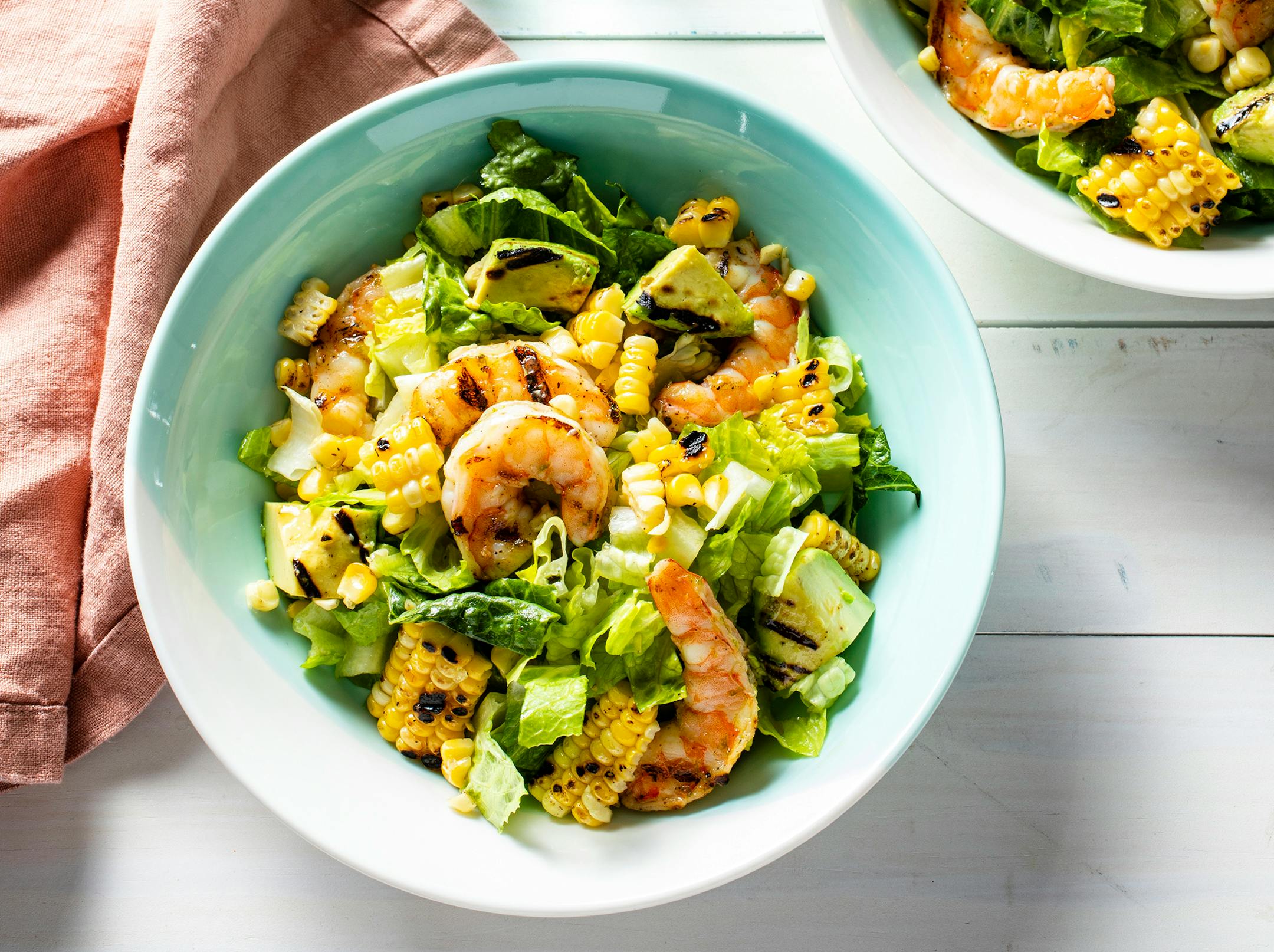 Grilled Shrimp, Corn, and Avocado Salad from "The Outdoor Cook: How to Cook Anything Outside" by America's Test Kitchen (2023, $30).Photo: Kevin White