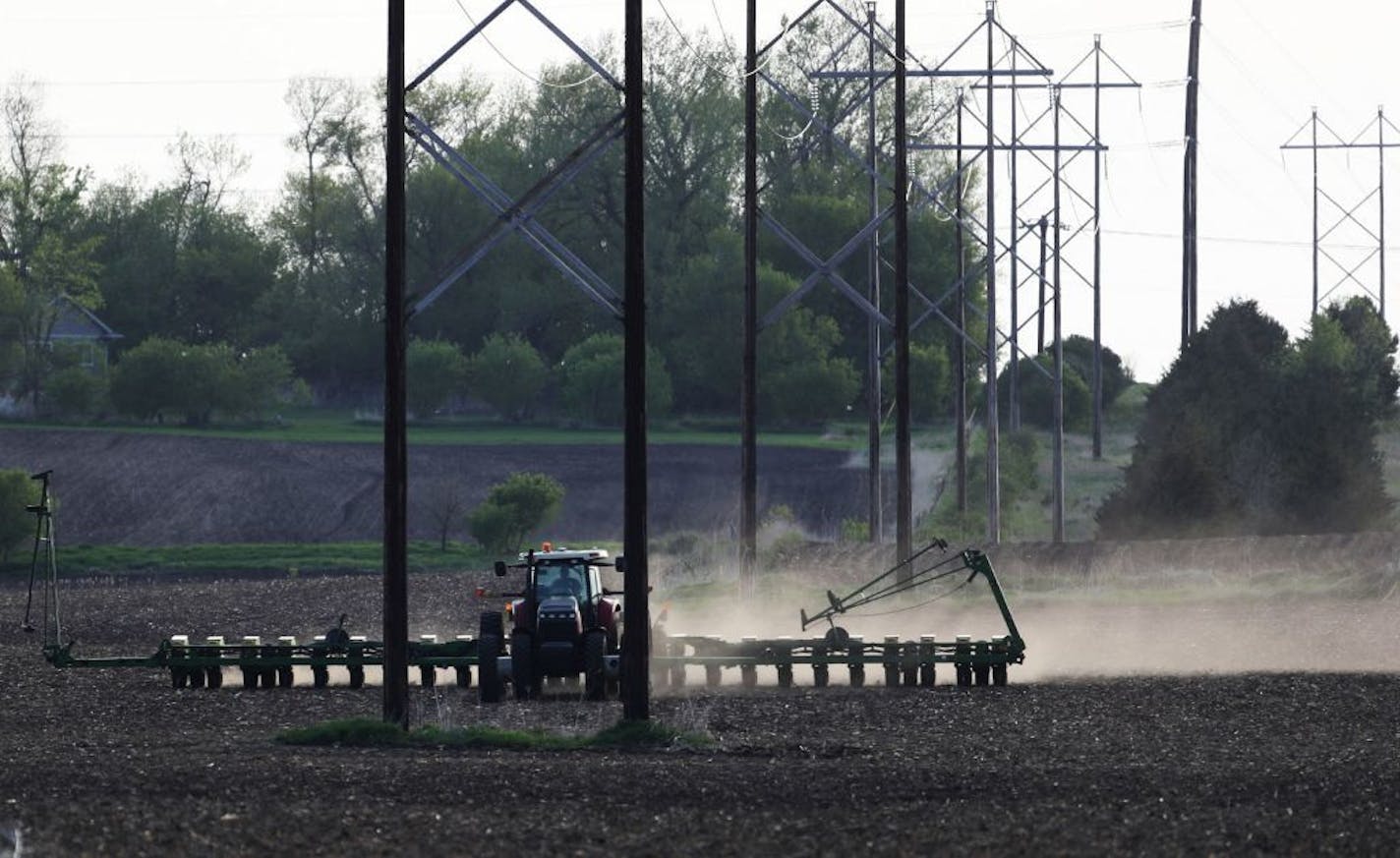 Crop farmer Bob Worth plants soybeans on the family farm Thursday, May 17, 2018, in Lake Benton, Minn.