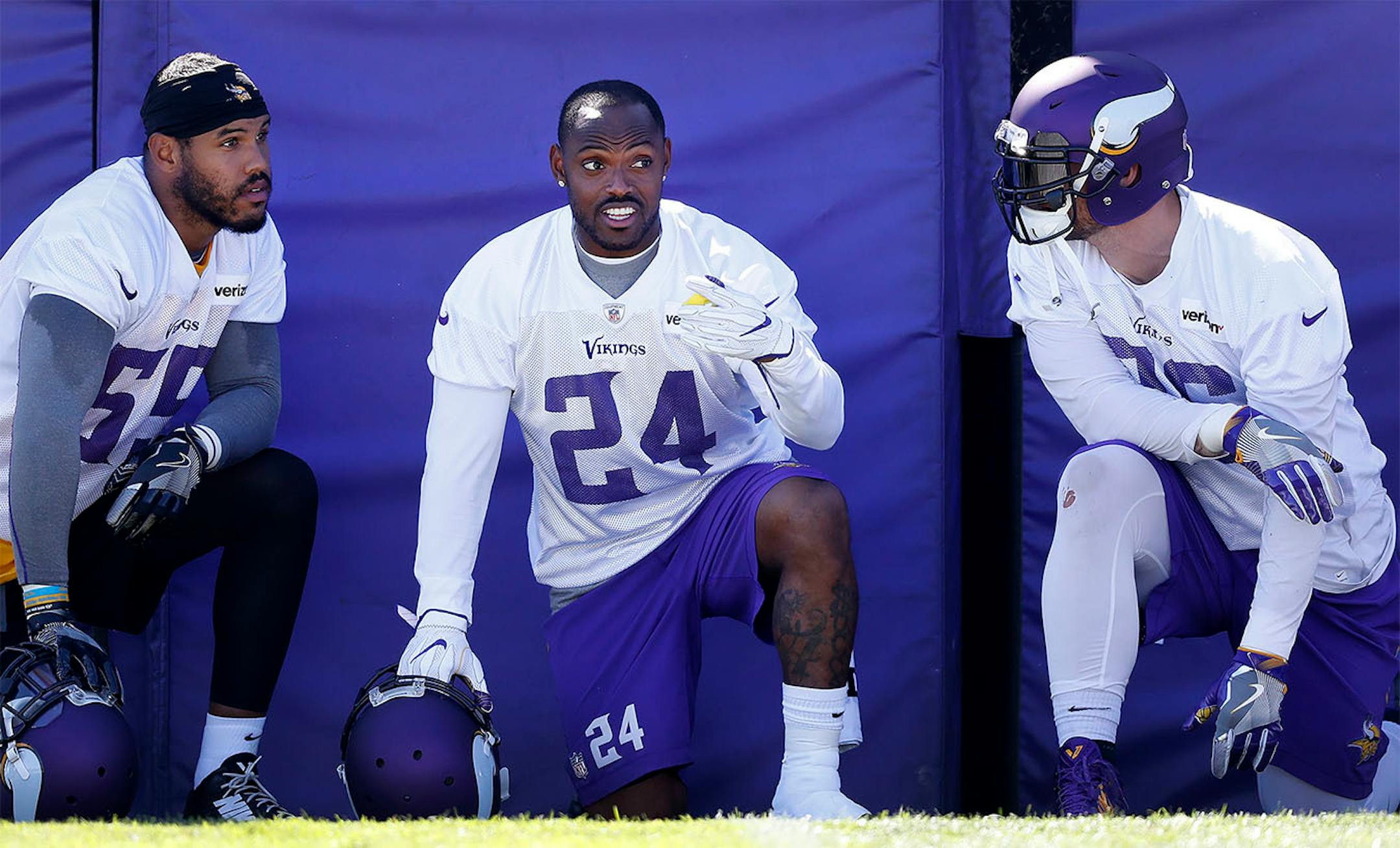 Anthony Barr (55), Captain Munnerlyn (24) and Brian Robison (96) during the afternoon practice on the first day of training camp in Mankato.
