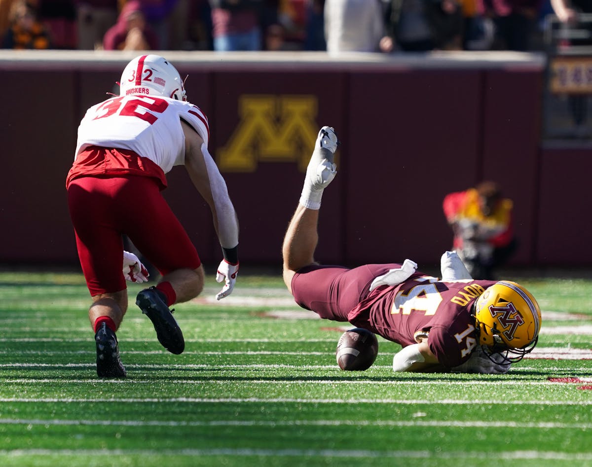 Minnesota Golden Gophers wide receiver Brady Boyd (14) recovered an onside kick to seal the 30-23 win over the Nebraska Cornhuskers.