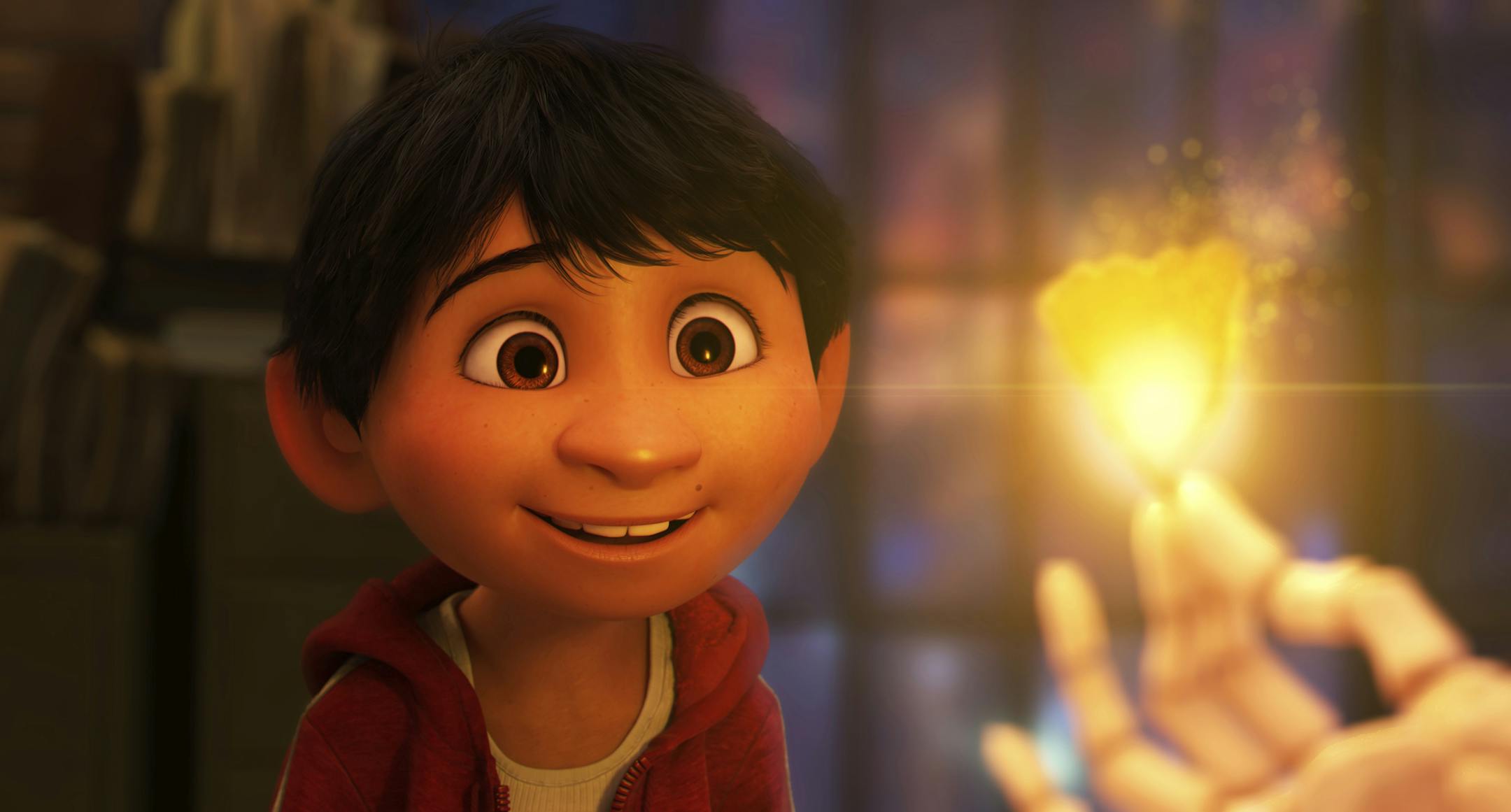 This image released by Disney-Pixar shows characters Miguel, voiced by Anthony Gonzalez in a scene from the animated film, "Coco." (Disney-Pixar via AP)