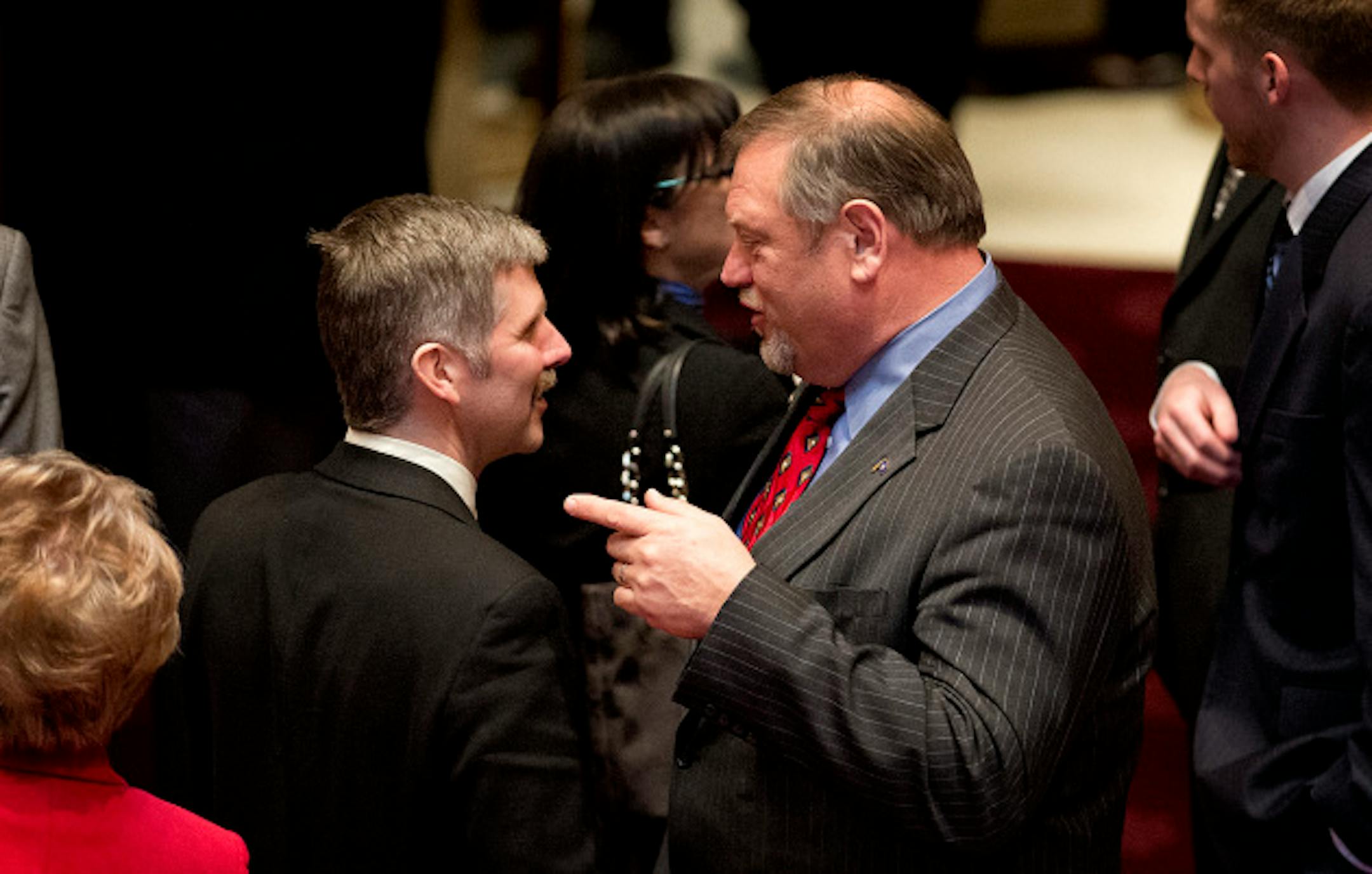 Senate Majority Leader Tom Bakk, right, congratulated bill author Sen. Tony Lourey after the final vote. The Minnesota Senate passed the health insurance exchange bill by a straight party line vote 39-28.  Next stop is Governor Dayton's desk.   Monday, March 18, 2013.    ]   GLEN STUBBE * gstubbe@startribune.com