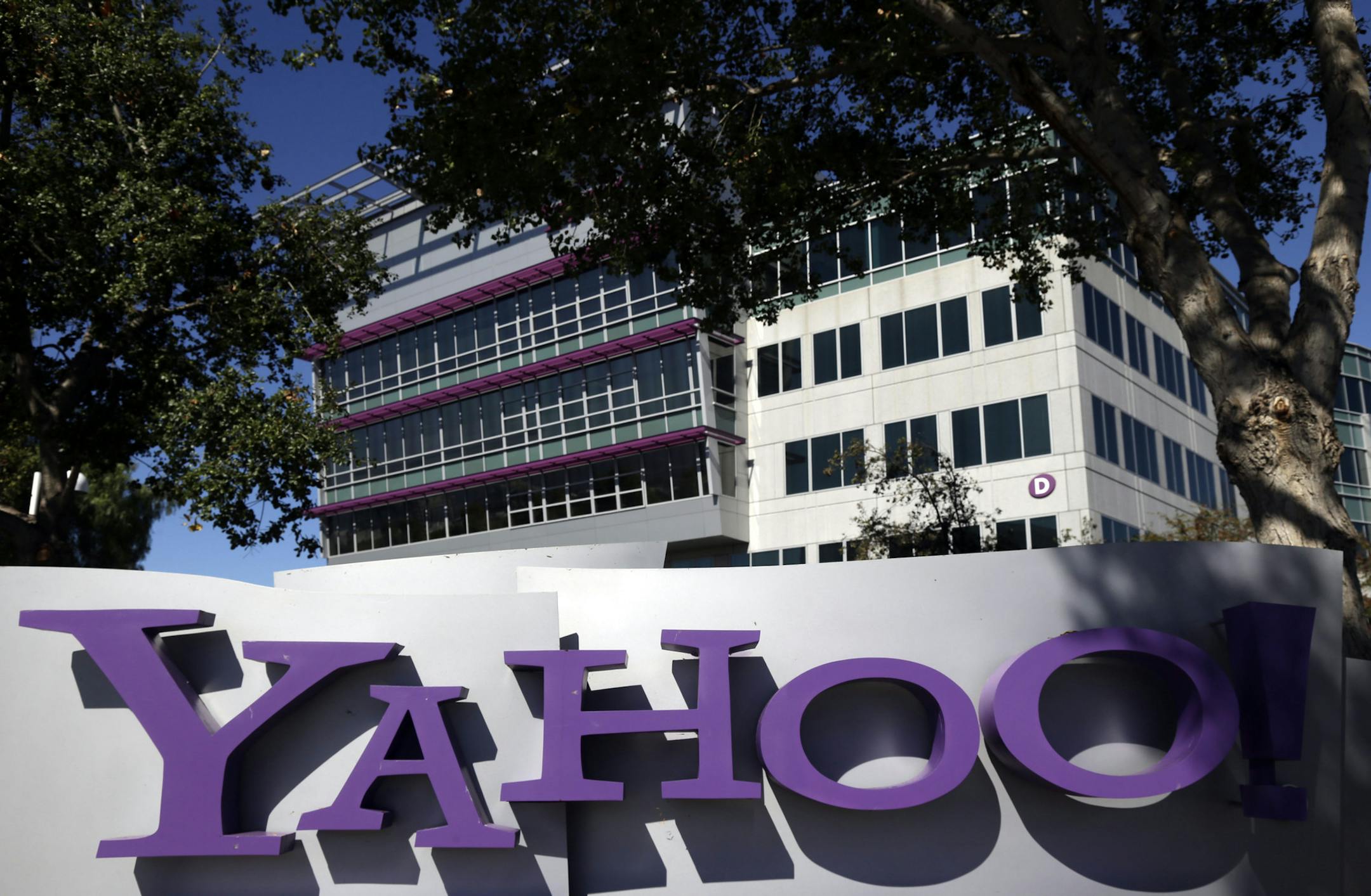 FILE - This Wednesday, Oct. 17, 2012, file photo, shows a sign in front of Yahoo! headquarters in Sunnyvale, Calif. Yahoo is expected to report quarterly earnings on Tuesday, Oct. 15, 2013. (AP Photo/Marcio Jose Sanchez, File)