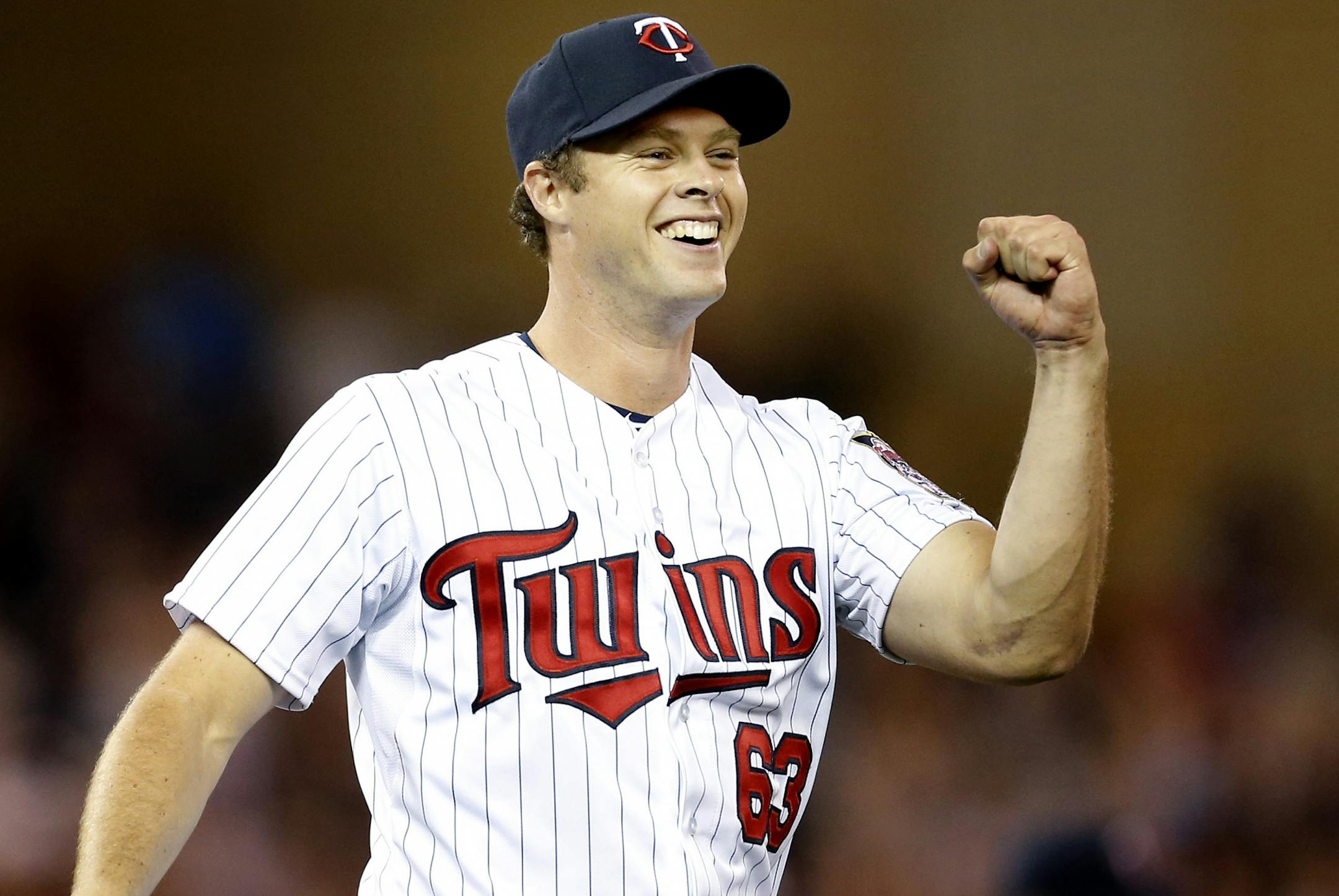 Minnesota Twins pitcher Andrew Albers (63) celebrated at the end of the game. Albers threw a complete game shutout. Minnesota beat Cleveland by a final score 3-0.