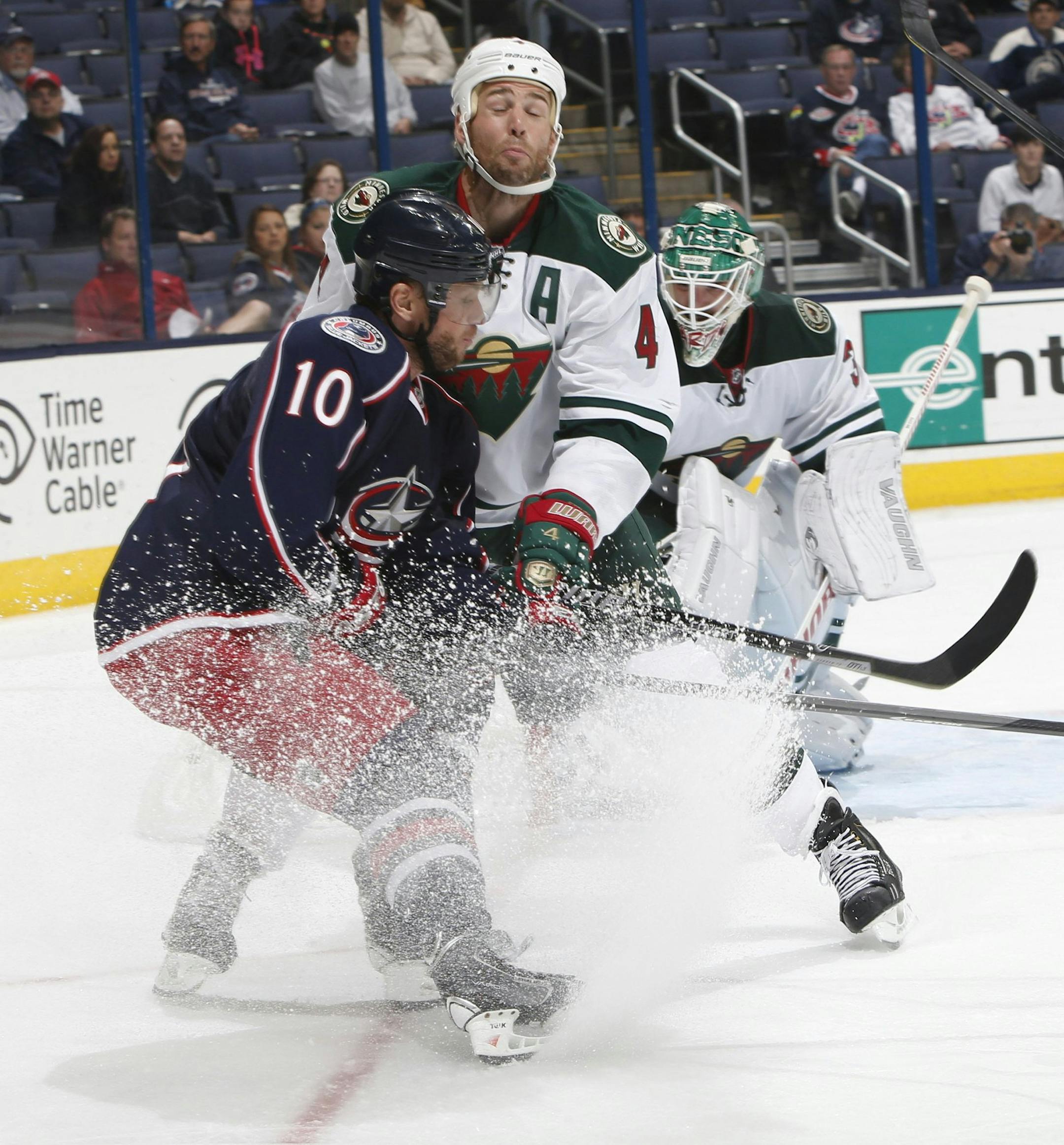 Marian Gaborik (10) of the Columbus Blue Jackets collides with Clayton Stoner (4) of the Minnesota Wild during Monday's preseason game at Nationwide Arena in Columbus, Ohio, on September 23, 2013. (Barbara J. Perenic/Columbus Dispatch/MCT)