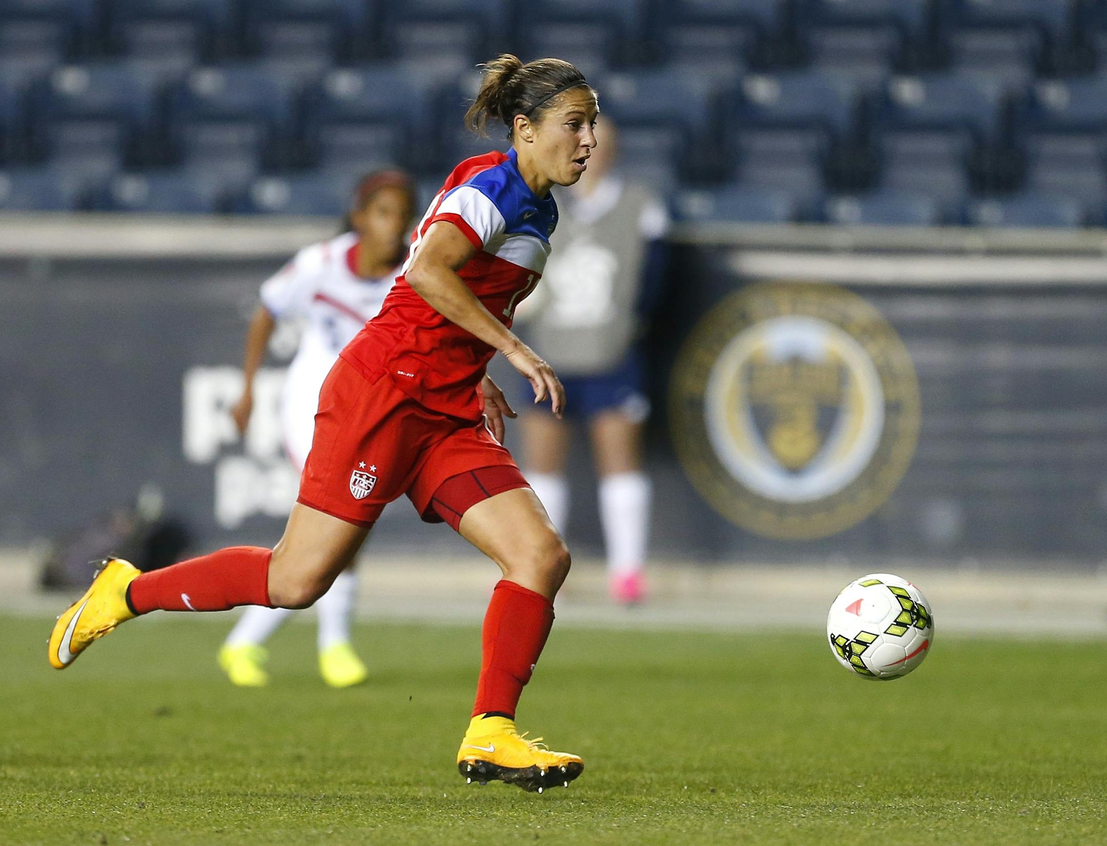 United States midfielder Carli Lloyd (10) in action against Costa Rica during the CONCACAF championship soccer match in Chester, Pa., Sunday, Oct. 26, 2014. The United States defeated Costa Rica 6-0. (AP Photo/Rich Schultz)