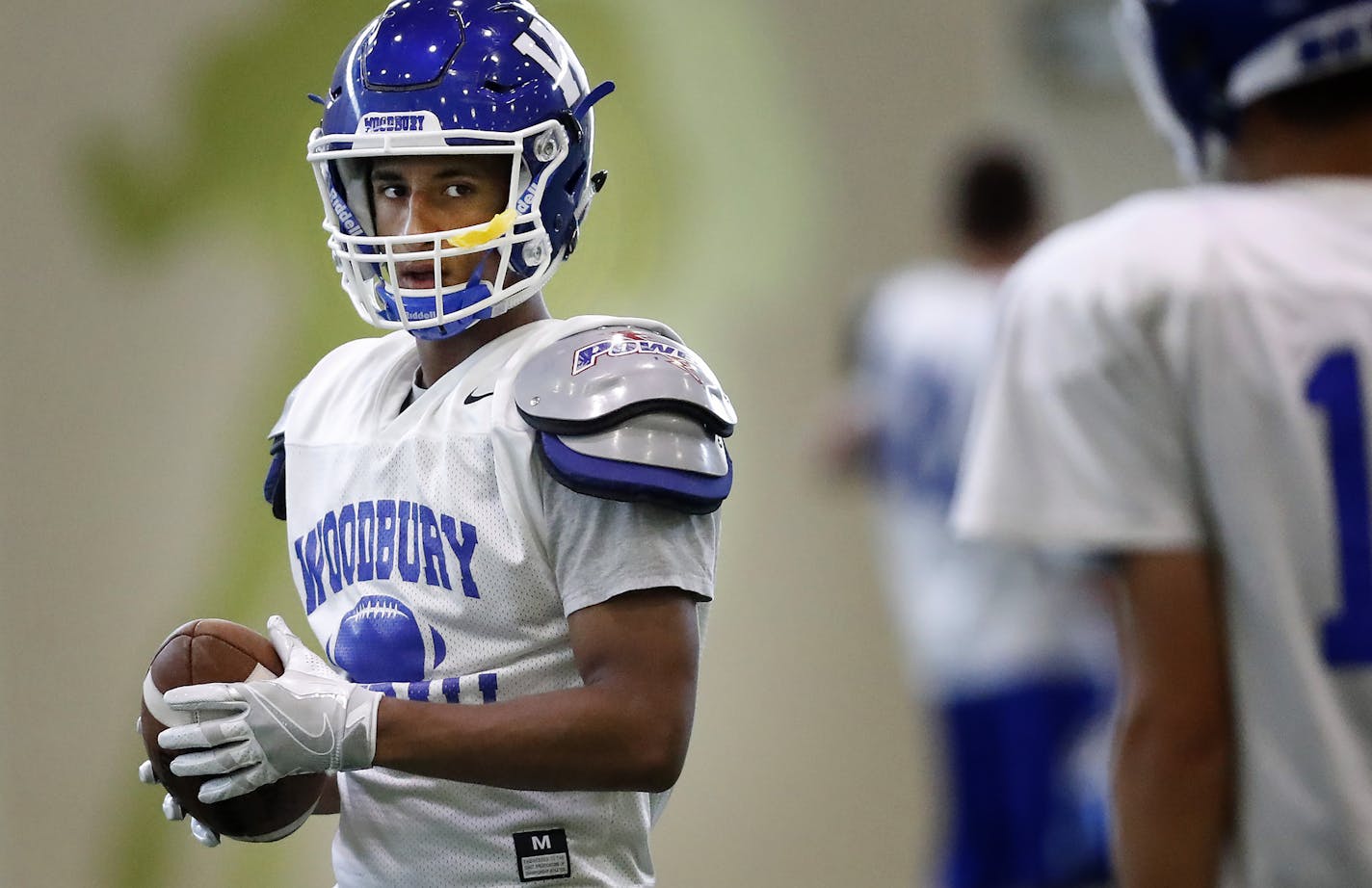 Wide receiver Jake West is one of the talented seniors on a highly touted Woodbury team that lost its opener. (Carlos Gonzalez, Star Tribune)