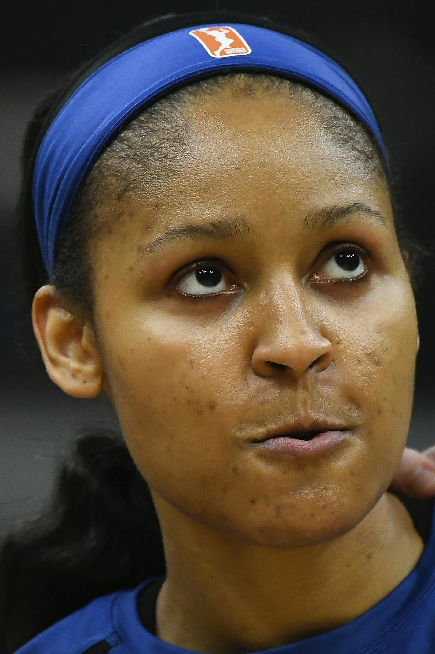 Minnesota Lynx guard Lindsay Whalen, left, talks with forward Maya Moore before the team's WNBA basketball game against the Los Angeles Sparks on Thursday, July 5, 2018, in Minneapolis. (Aaron Lavinsky/Star Tribune via AP)