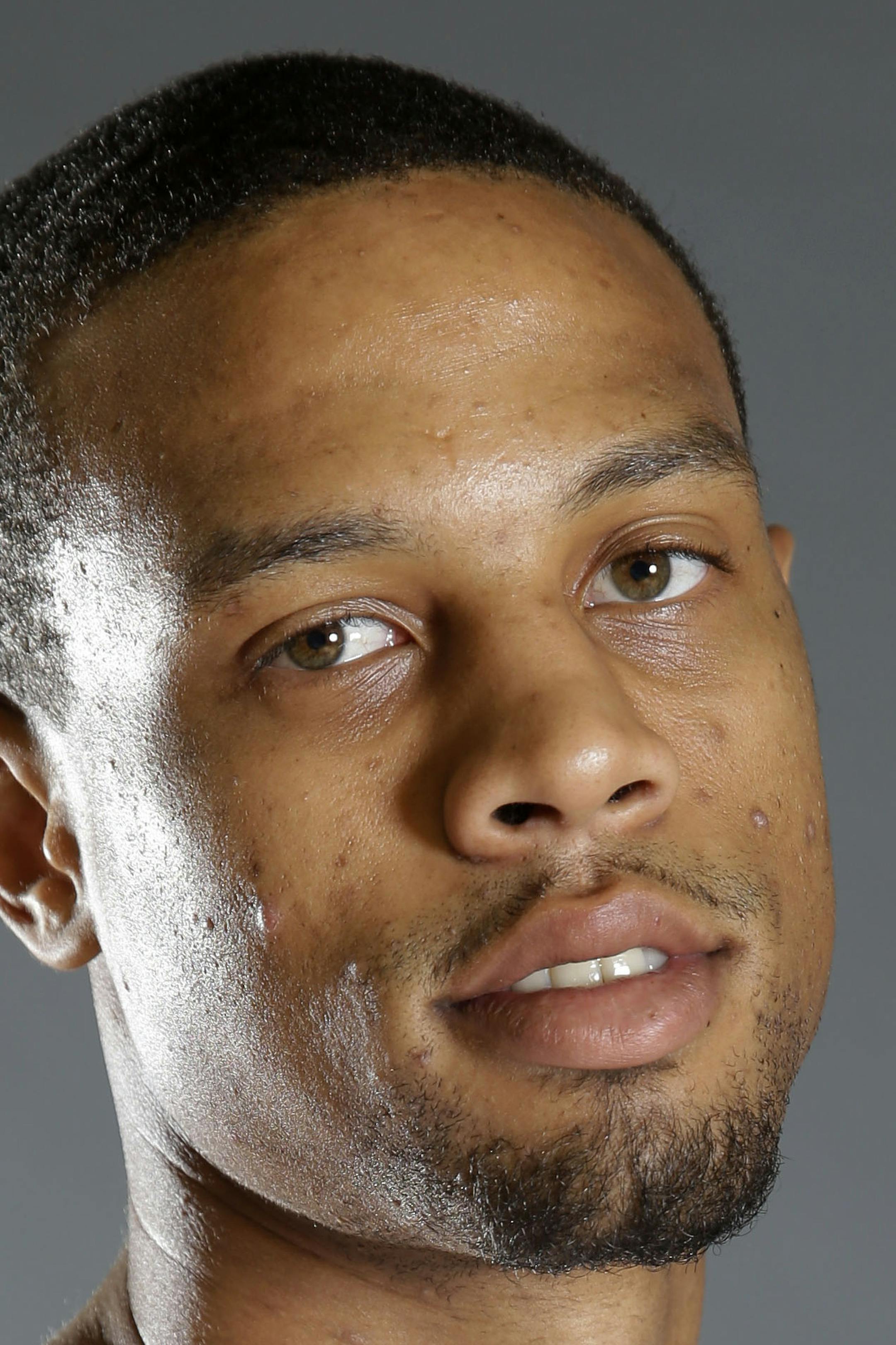 FILE - In this 2015, file photo, New Orleans Pelicans guard Bryce Dejean-Jones (31) poses during their NBA basketball media day in Metairie, La. Police say Saturday, May 28, 2016, Dejean-Jones was fatally shot after breaking down the door to a Dallas apartment. Sr. Cpl. DeMarquis Black said in a statement that officers were called early Saturday morning and found the 23-year-old player collapsed in an outdoor passageway. He was taken to a hospital where he died. (AP Photo/Gerald Herbert, File)