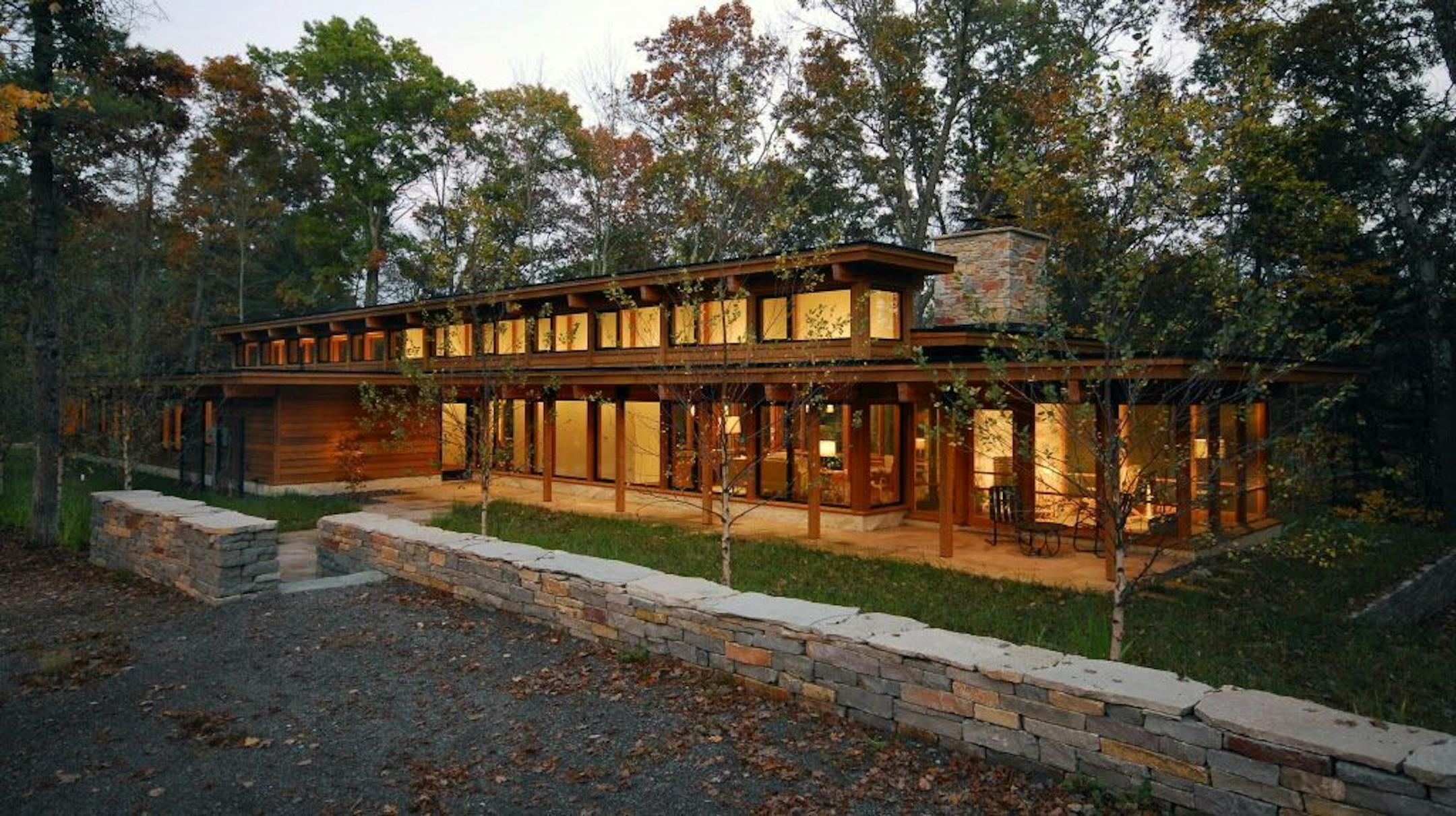 Clerestory windows resemble lanterns in this river house on a bluff over the Black River, by Katherine Hillbrand, SALA Architects.