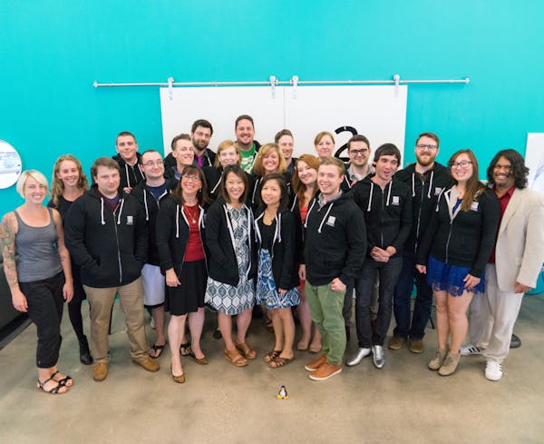 A recent graduating class from Prime Digital Academy, which will relocate in January from Bloomington to Minneapolis.