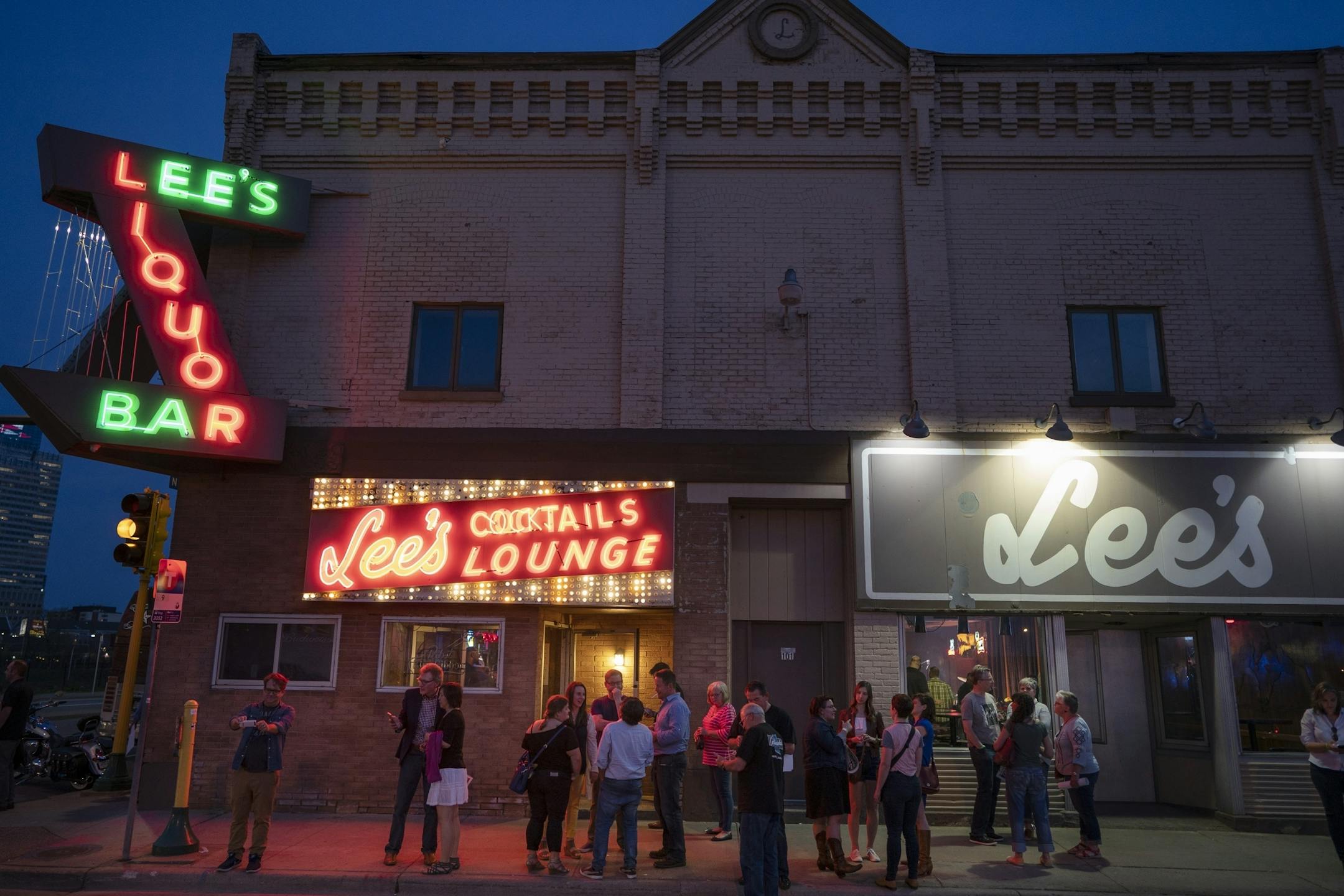 People gathered outside of Lee's Liquor Lounge Tuesday May 14, 2019 in Minneapolis, MN.