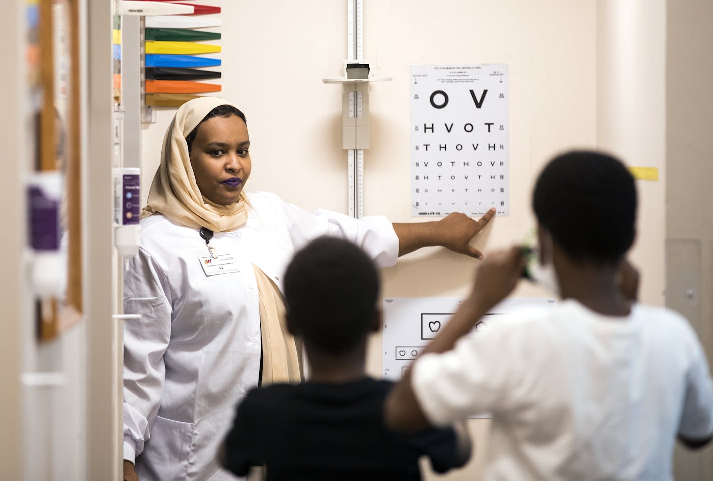 Medical assistant Fathia Salah does an eye exam on patients. ] LEILA NAVIDI &#xef; leila.navidi@startribune.com BACKGROUND INFORMATION: Patients see providers at Community University Health Care Center in Minneapolis on Tuesday, September 26, 2017. While the spotlight has been on Senate Republican efforts to restructure ObamaCare and cut back Medicaid, three key health care programs will lose funding unless Congress acts by the end of the week. This includes $27 million that Minnesota safety net