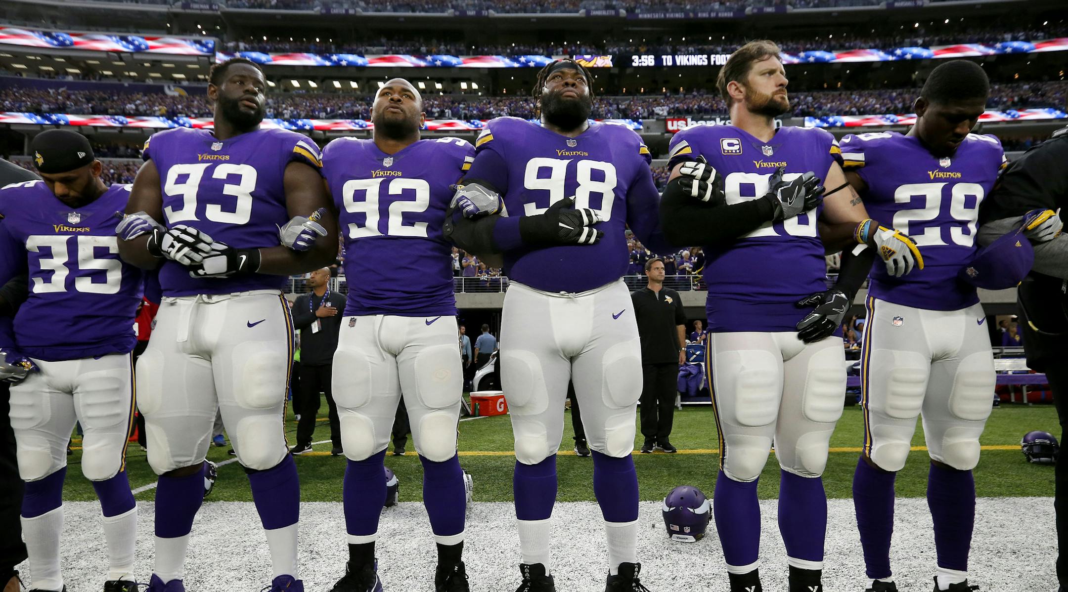 Minnesota Vikings players joined arms during the National Anthem before the start of the game. ] CARLOS GONZALEZ ï cgonzalez@startribune.com - October 1, 2017, Minneapolis, MN, NFL, US Bank Stadium, Minnesota Vikings vs. Detroit Tigers