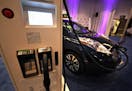 The Nissan LEAF is among the electric automobiles on display in the Electric Room at the Twin Cities Auto Show. ] JIM GEHRZ &#xef; james.gehrz@startri