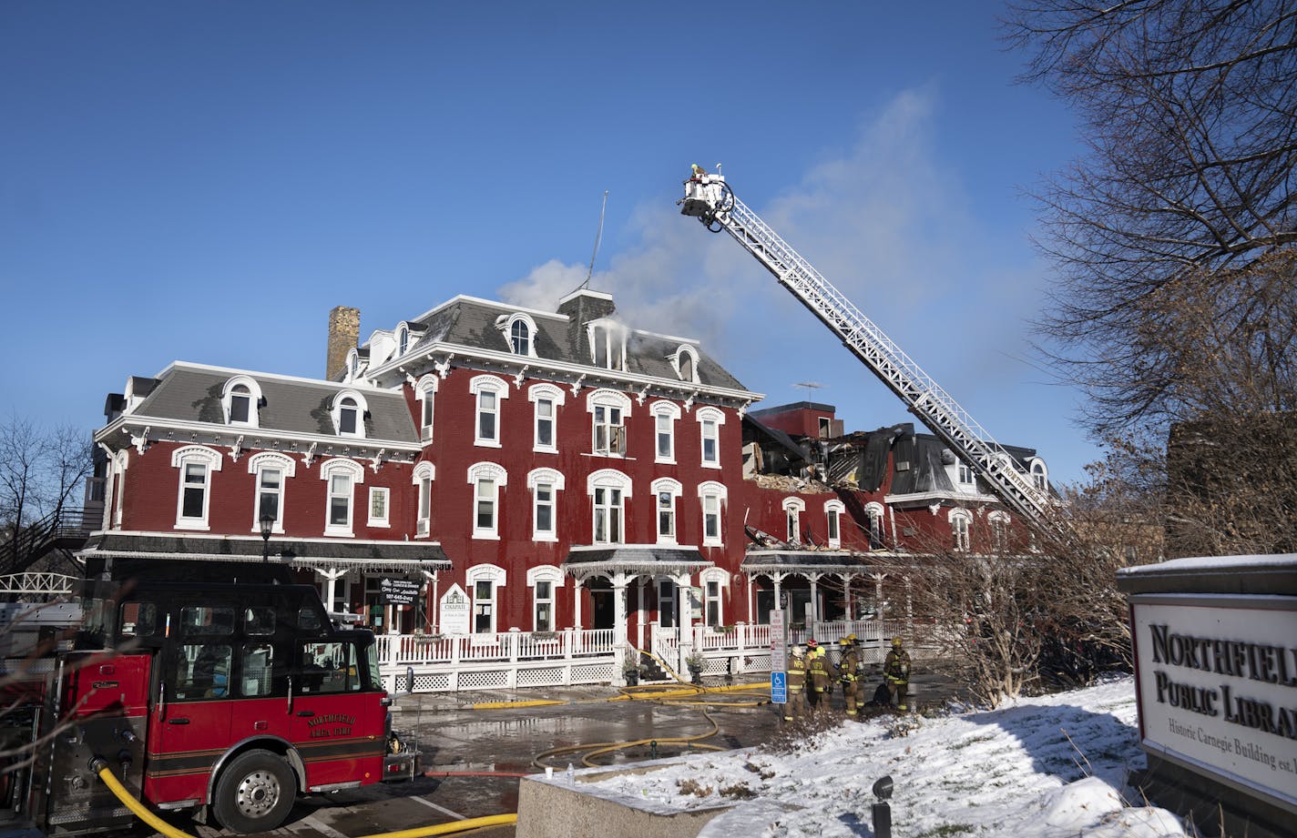 Firefighters worked to put out a fire that started on Thursday that heavily damaged the Archer House building in downtown in Northfield, Minn. Photographed on Friday, November 13, 2020. It continued to burn Friday morning and the 143-year-old building was judged likely a total loss. ] RENEE JONES SCHNEIDER renee.jones@startribune.com