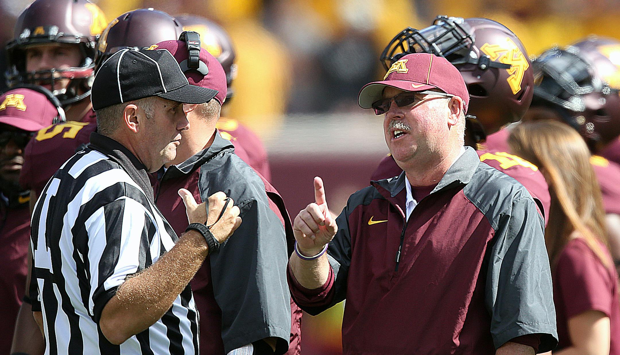 Coach Jerry Kill expressed his concern over a call by the officials. ]JIM GEHRZ &#x201a;&#xc4;&#xa2; jgehrz@startribune.com Minneapolis, MN / Sept 21, 2013, 11:00 AM BACKGROUND INFORMATION- The University of Minnesota football team, lead by head coach Jerry Kill, played San Jose State at TCF Bank Stadium. Kill suffered a seizure on the sidelines last week, but returned to coach the team on Saturday. A rally in support of the coach was held prior to the game, organized by The Epilepsy Foundation