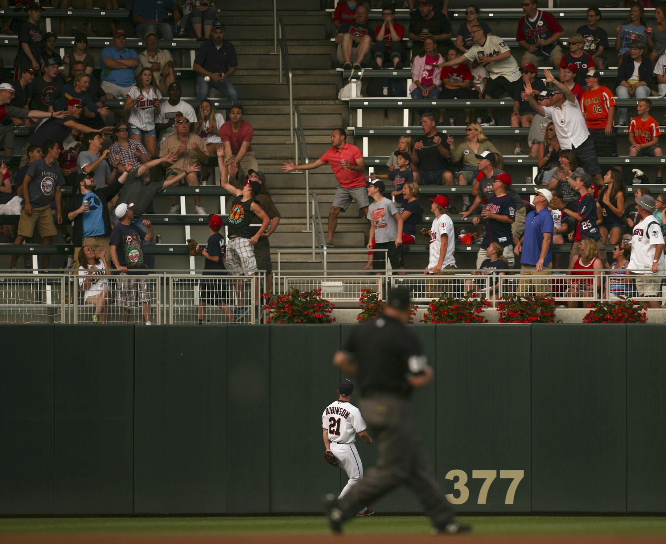 Minnesota Twins left fielder Shane Robinson watched Detroit Tigers second baseman Ian Kinsler's first inning home run fall in the stands Thursday night at Target Field. JEFF WHEELER &#xef; jeff.wheeler@startribune.com The Twins began a series with the Detroit Tigers Thursday night, July 9, 2015 at Target Field in Minneapolis.