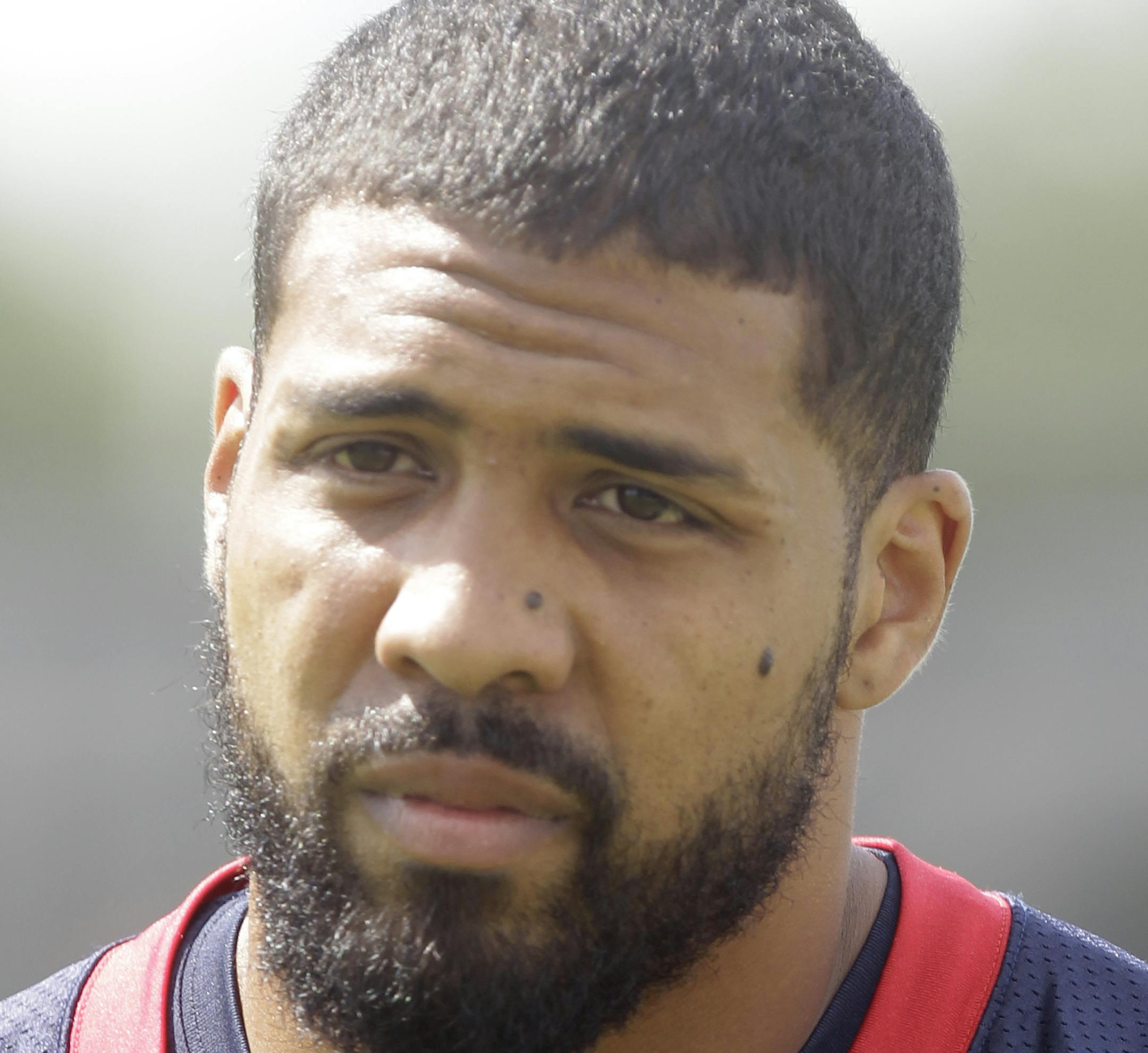 Houston Texans running back Arian Foster walks onto the field during NFL football minicamp, Tuesday, June 17, 2014, in Houston. (AP Photo/Patric Schneider)