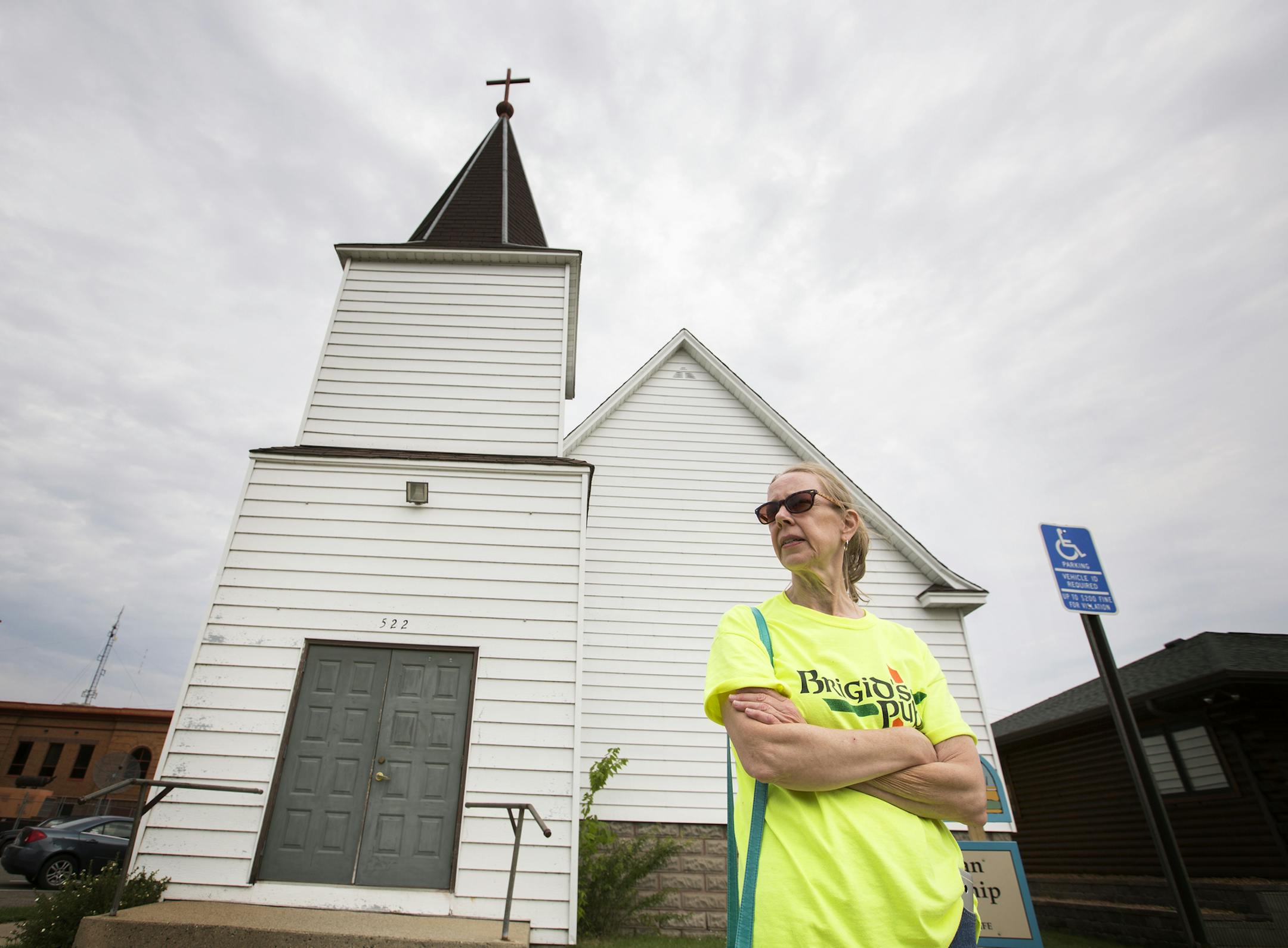 Nameless Coalition for the Homeless member Kristi Miller, a local bar owner, stands in front of the building that will be become a homeless shelter in downtown Bemidji on Thursday, August 13, 2015. ] LEILA NAVIDI leila.navidi@startribune.com / BACKGROUND INFORMATION: The Nameless Coalition for the Homeless, an advocacy group in Bemidji, raised money to purchase a building after seeing a great need in the community for a homeless shelter in Bemidji that accepts people who are chronically inebriat
