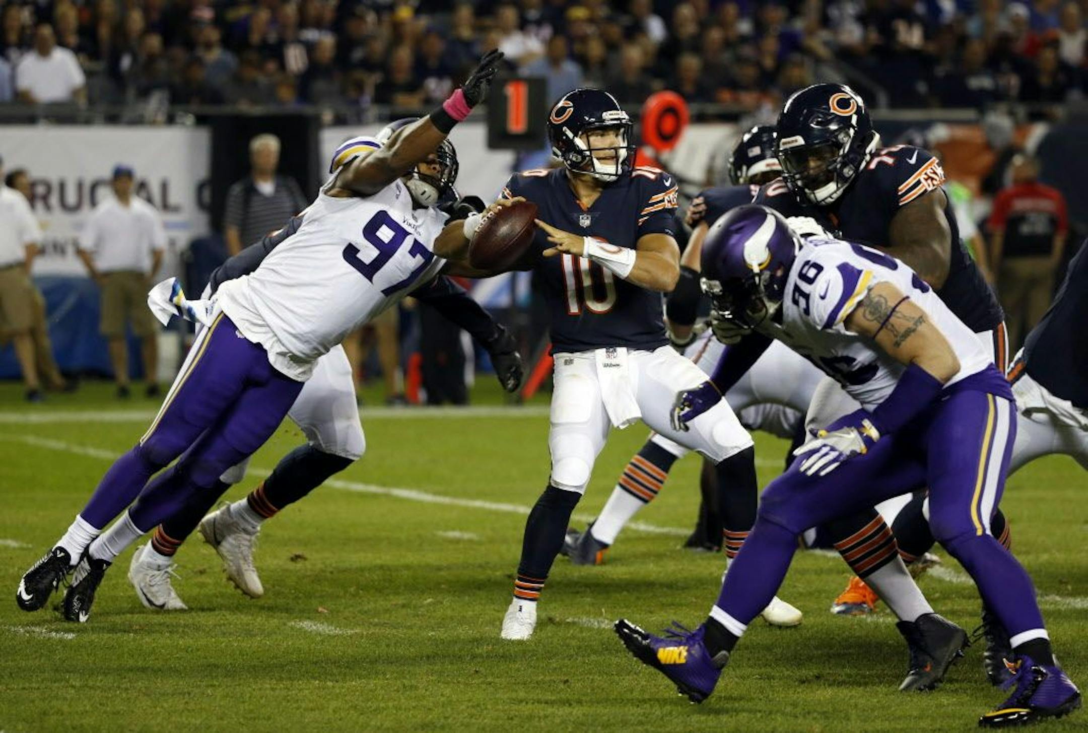 Minnesota Vikings defensive end Everson Griffen (97) strips the ball from Chicago Bears quarterback Mitchell Trubisky (10) during the first half of an NFL football game, Monday, Oct. 9, 2017, in Chicago.
