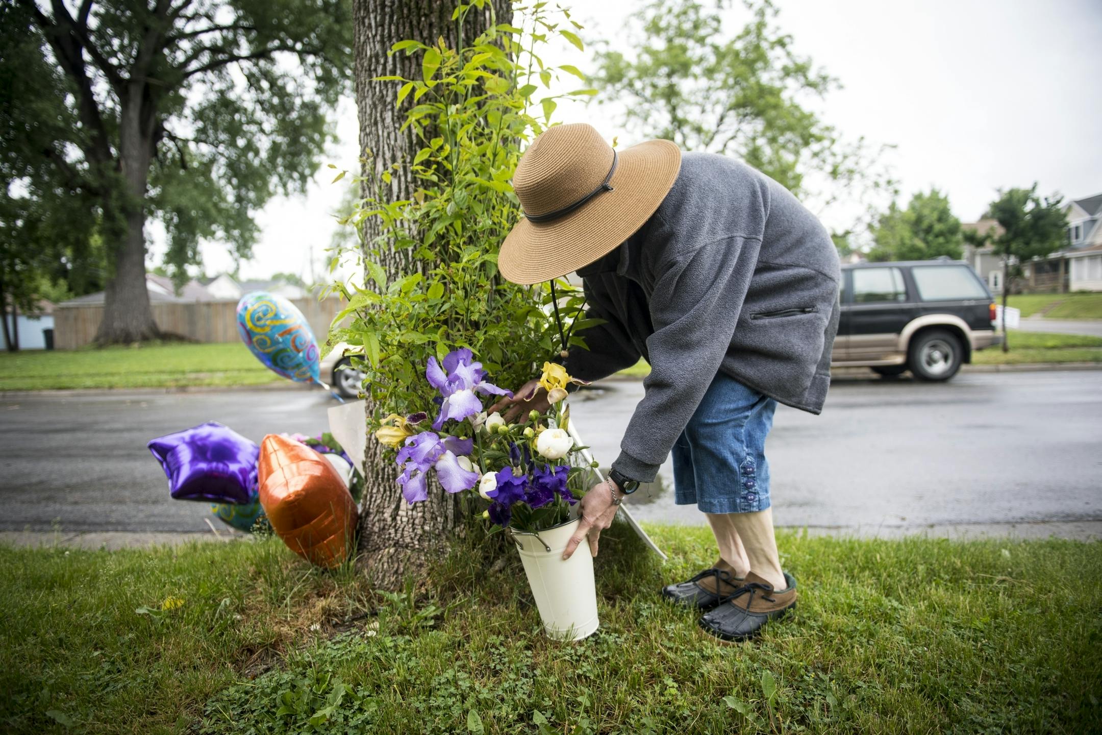 Lifelong north Minneapolis resident Becky McConico placed flowers from her garden at a memorial for 59-year-old Birdell Beeks, the woman killed in Thursday night's shooting. "I heard the shots and we called (911)... we heard the screams" said McConico, who lives a few houses down from the scene of the shooting. When she saw a crowd gathering at the site of Birdell's shooting Friday, she decided to pick some flowers from her garden and place them at the memorial.