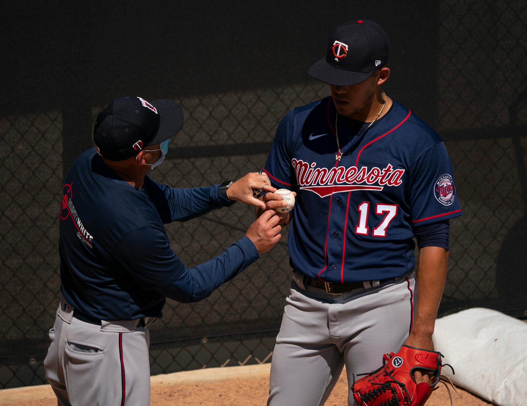 Twins pitching coach Wes Johnson offered a grip suggestion to Twins starting pitcher Jose Berrios as he  threw in the bullpen Tuesday afternoon.