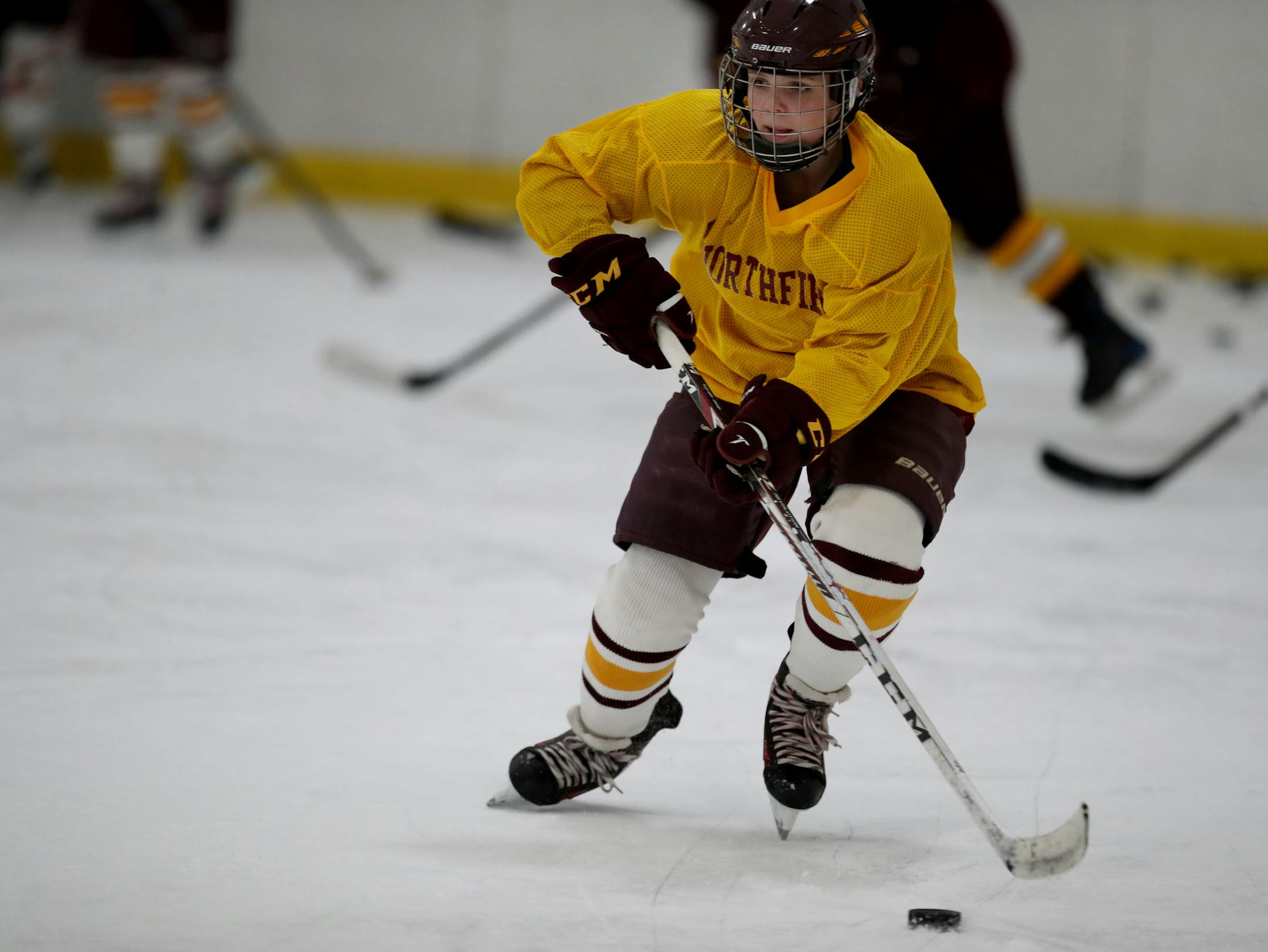 Jessica Boland member of Northfield girls hockey team pushed the puck up ice during practice November 15,2017 in Northfield, MN.] JERRY HOLT &#xef; jerry.holt@startribune.com