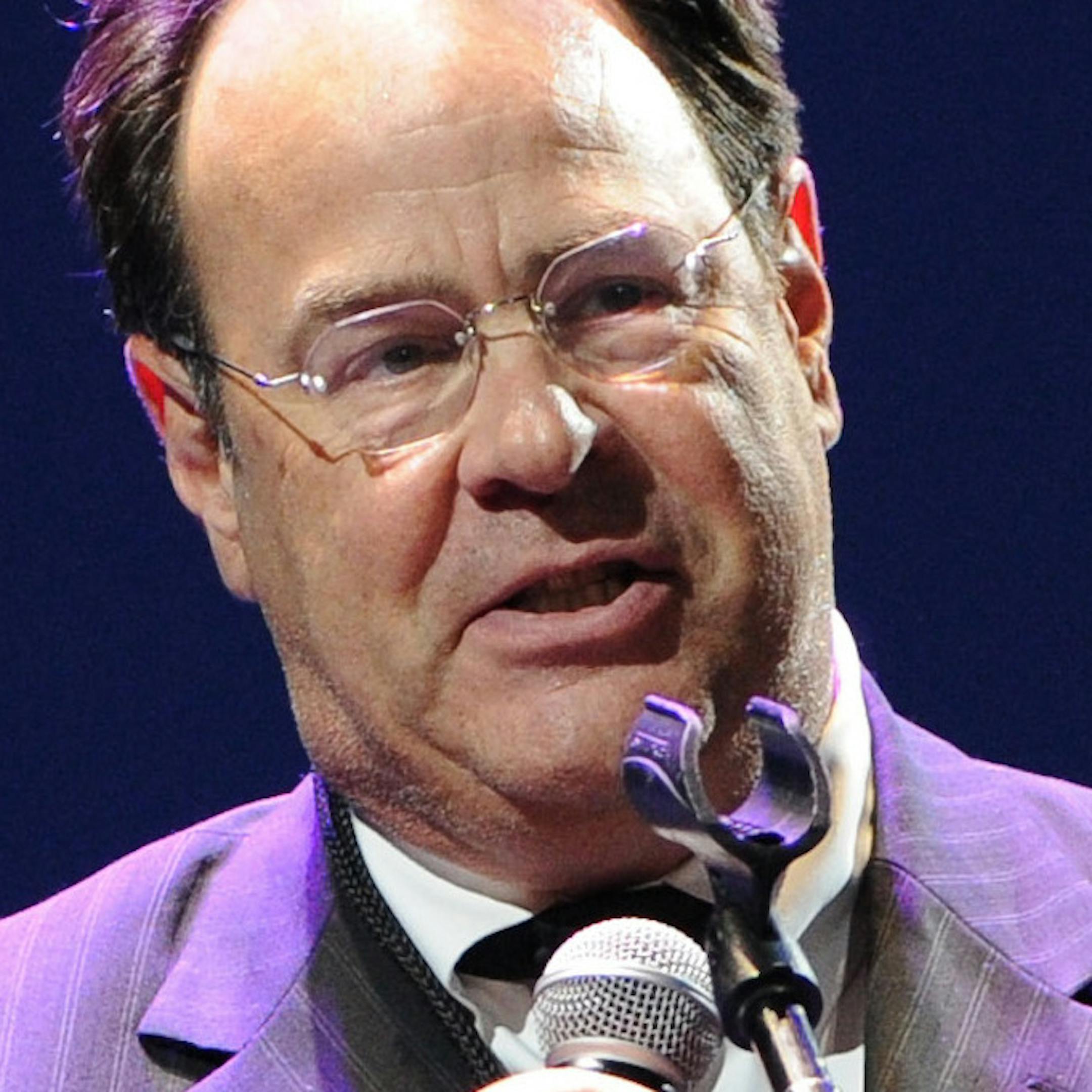 Actor and musician Dan Aykroyd serves as MC at Eric Clapton's Crossroads Guitar Festival 2013 at Madison Square Garden on Friday April 12, 2013 in New York. (Photo by Evan Agostini/Invision for Hard Rock International/AP Images) ORG XMIT: MIN2013052213021059