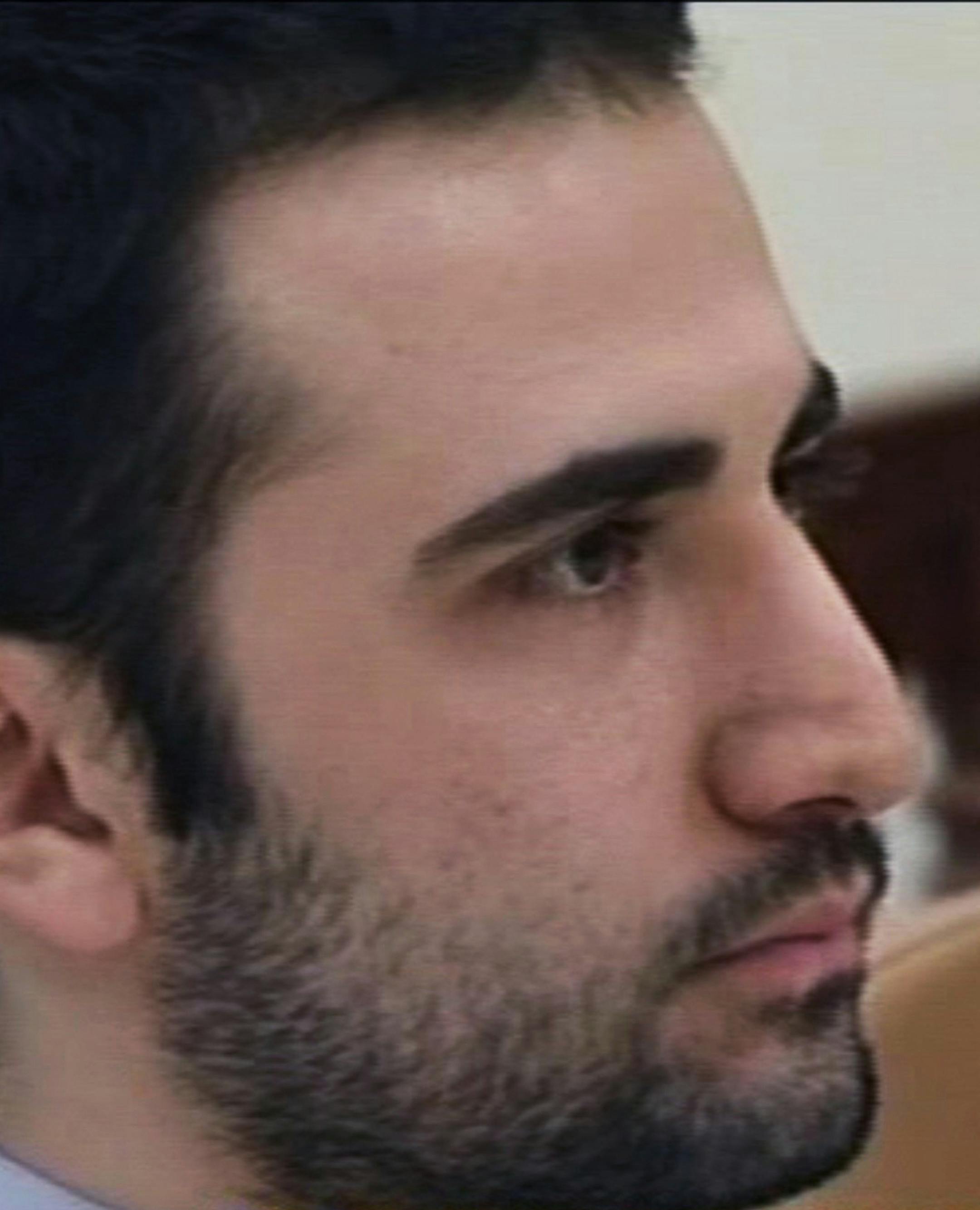 FILE - In this Tuesday, Dec. 27, 2011 video frame grab image made from the Iranian broadcaster IRIB TV, U.S. citizen Amir Mirzaei Hekmati, accused by Iran of spying for the CIA, sits in Tehran's revolutionary court, in Iran. Iran state television has reported that the government has released several dual-national prisoners. The Associated Press has confirmed that three of them were Washington Post reporter Jason Rezaian, former U.S. Marine Amir Hekmati and pastor Saeed Abedini. (AP Photo/IRIB, F