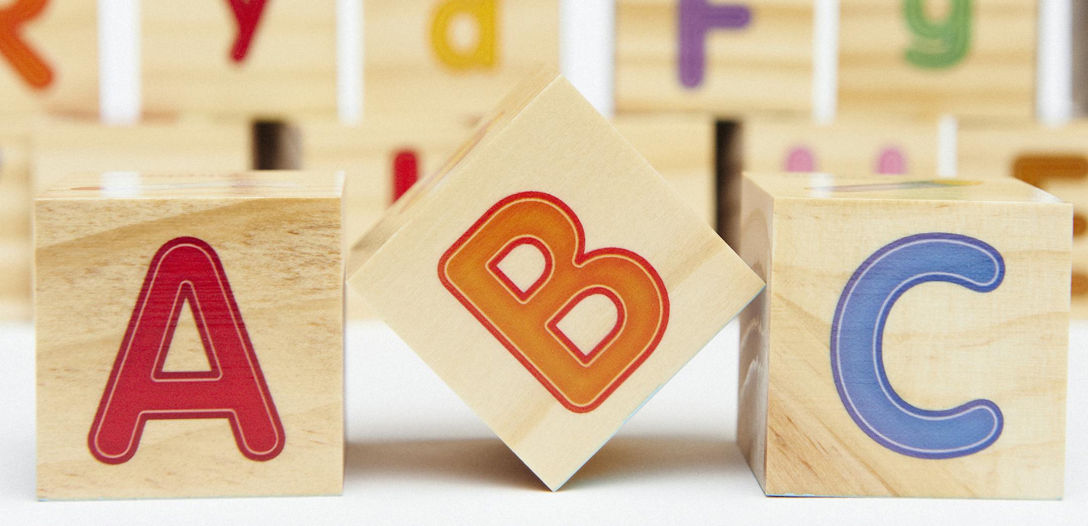 iStock
Spelling blocks toys with ABC in the foreground.